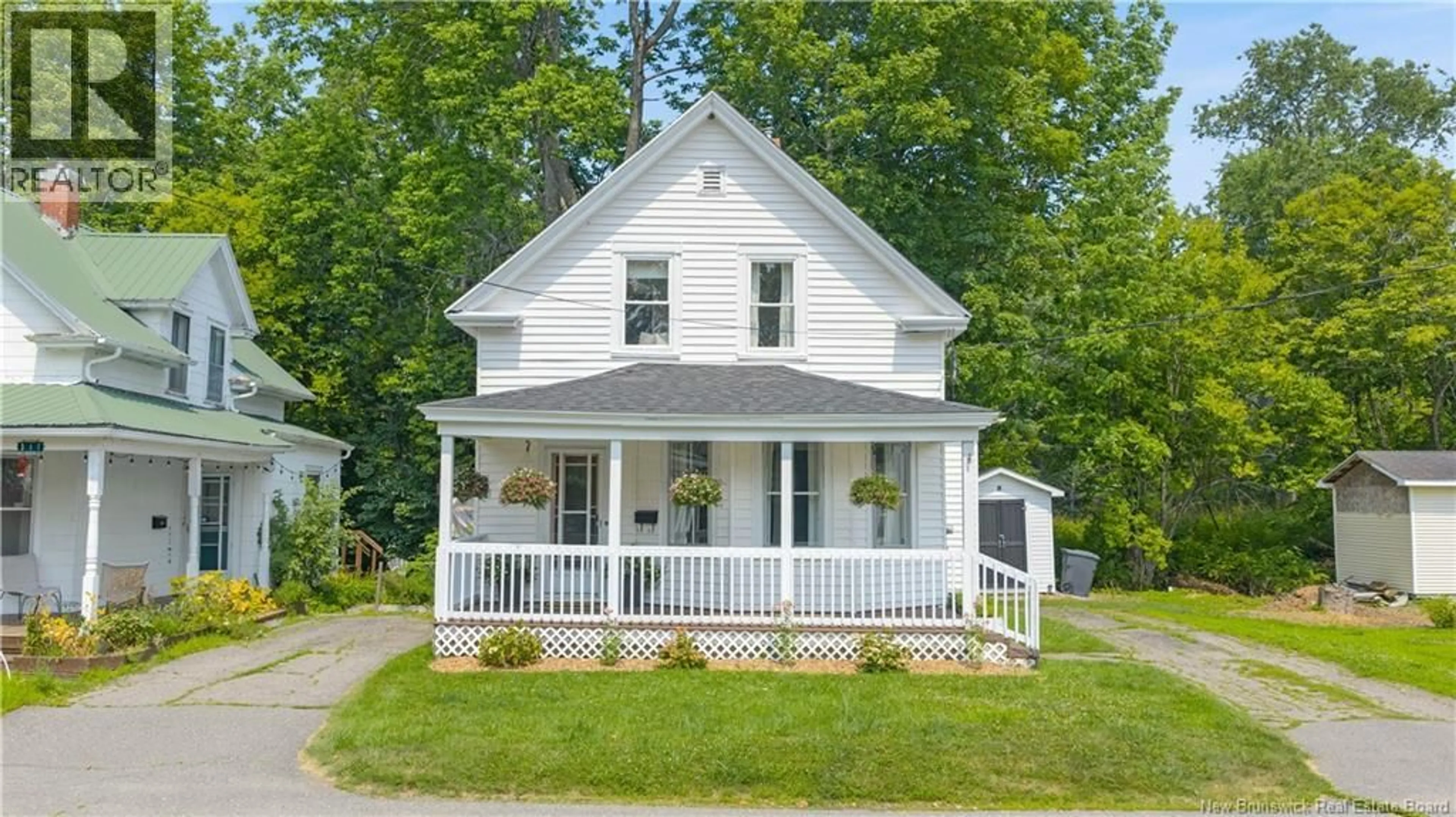 Home with vinyl exterior material, street for 15 MCCOLL STREET, St. Stephen New Brunswick E3L2M6