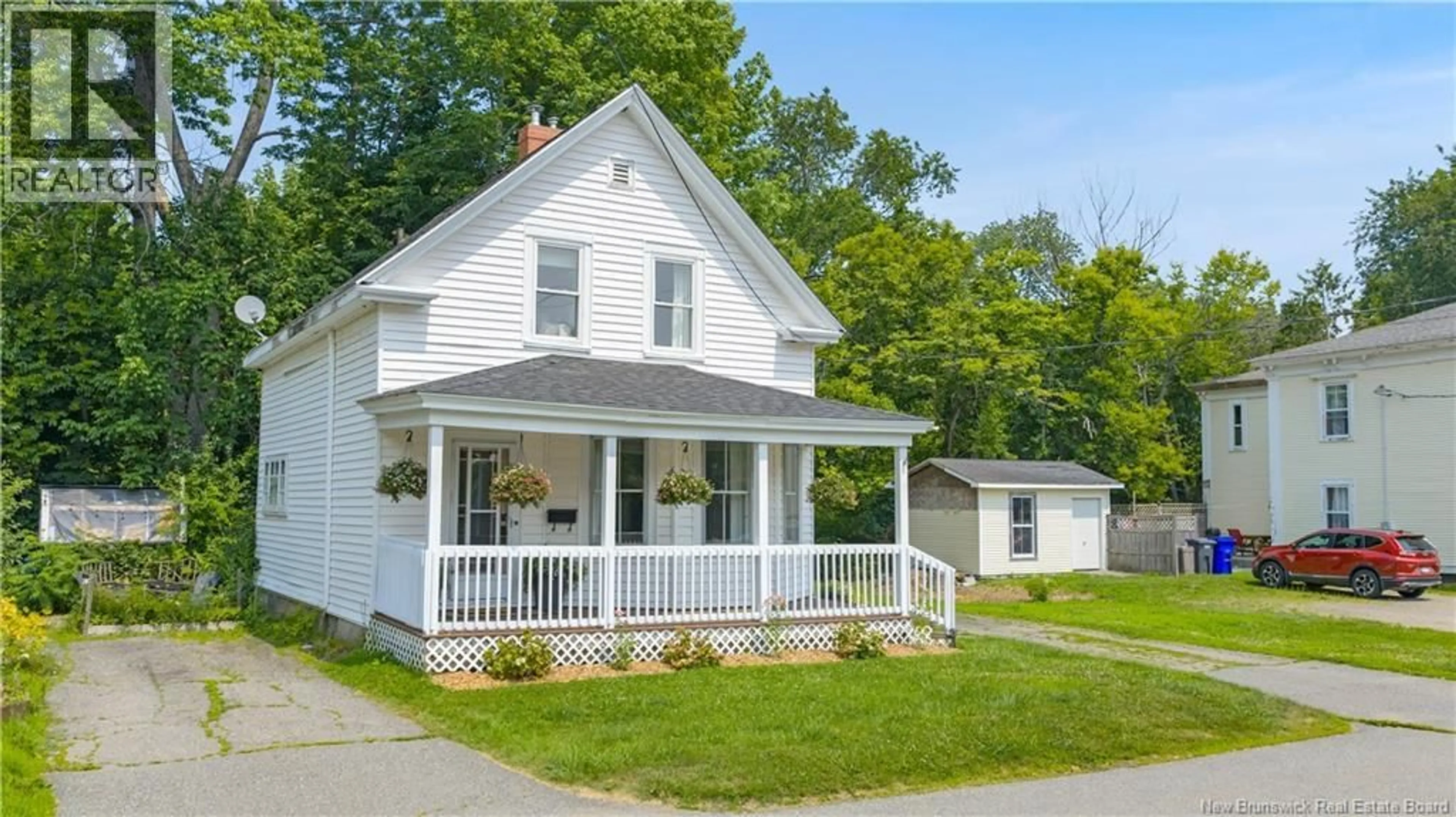 Home with vinyl exterior material, street for 15 MCCOLL STREET, St. Stephen New Brunswick E3L2M6
