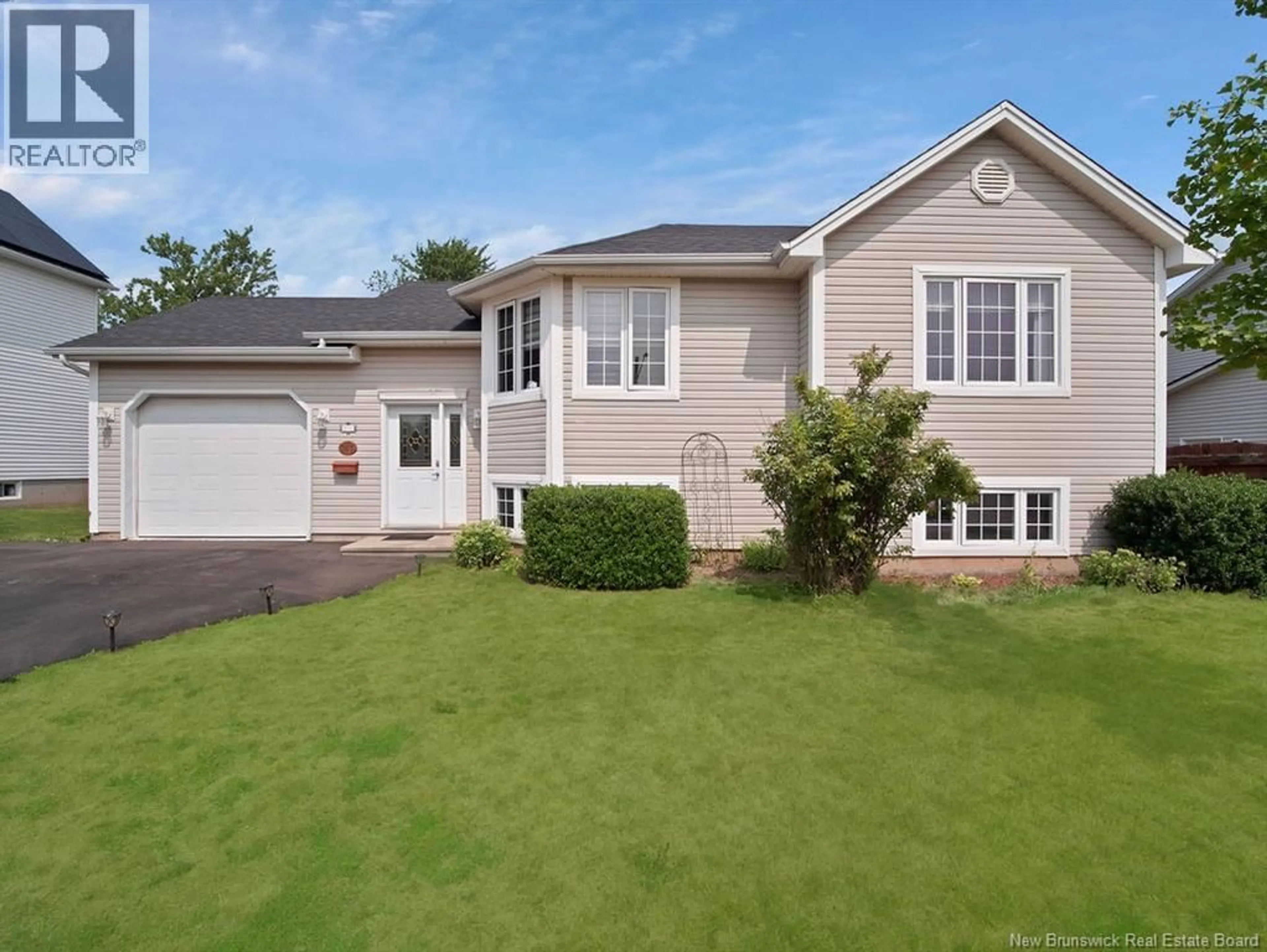 Home with vinyl exterior material, street for 143 TWIN OAKS DRIVE, Moncton New Brunswick E1G4W4