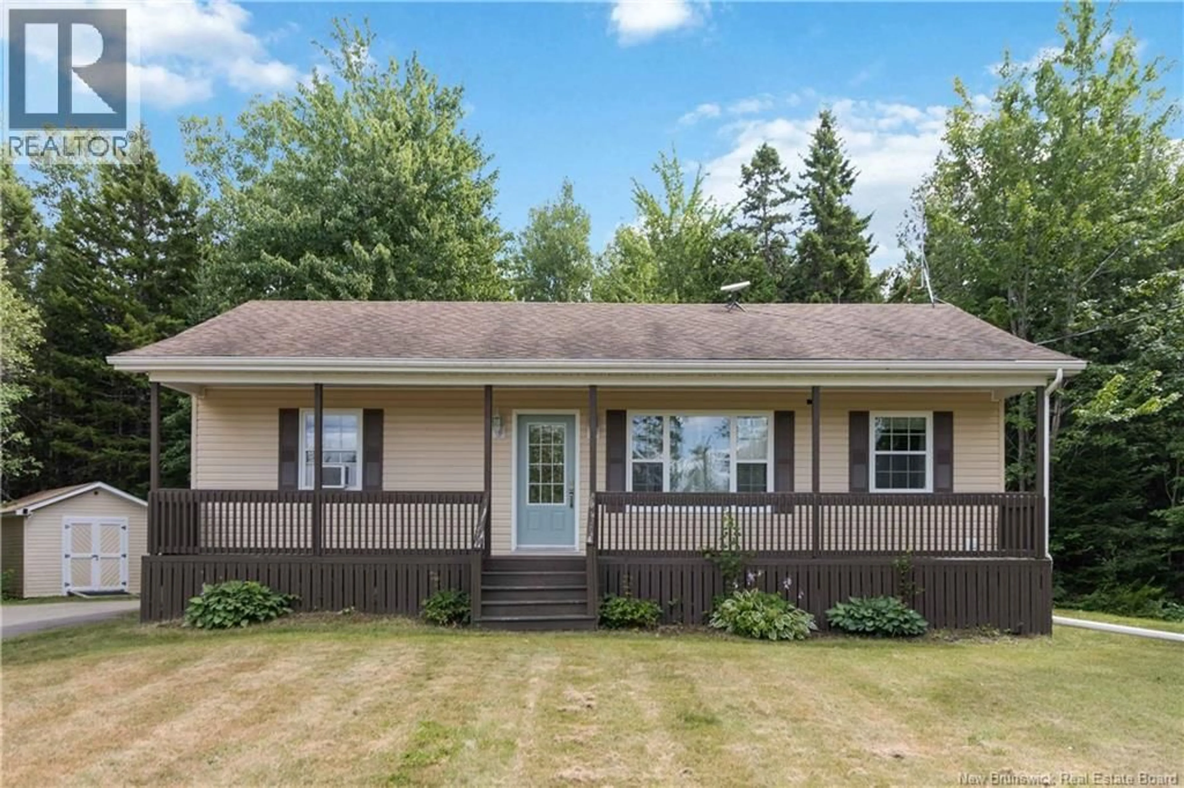 Home with vinyl exterior material, street for 7925 515 ROUTE, Saint-Paul New Brunswick E4T3R5