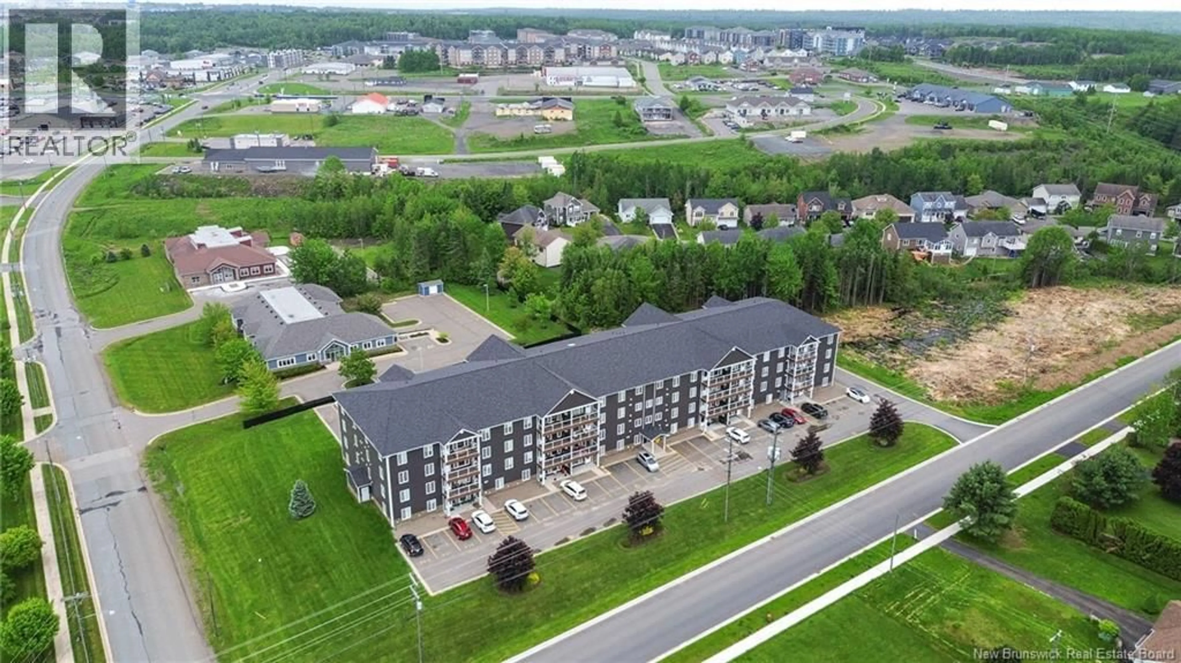 A pic from outside/outdoor area/front of a property/back of a property/a pic from drone, building for 330 - 225 SERENITY LANE LANE, Fredericton New Brunswick E3B0H1
