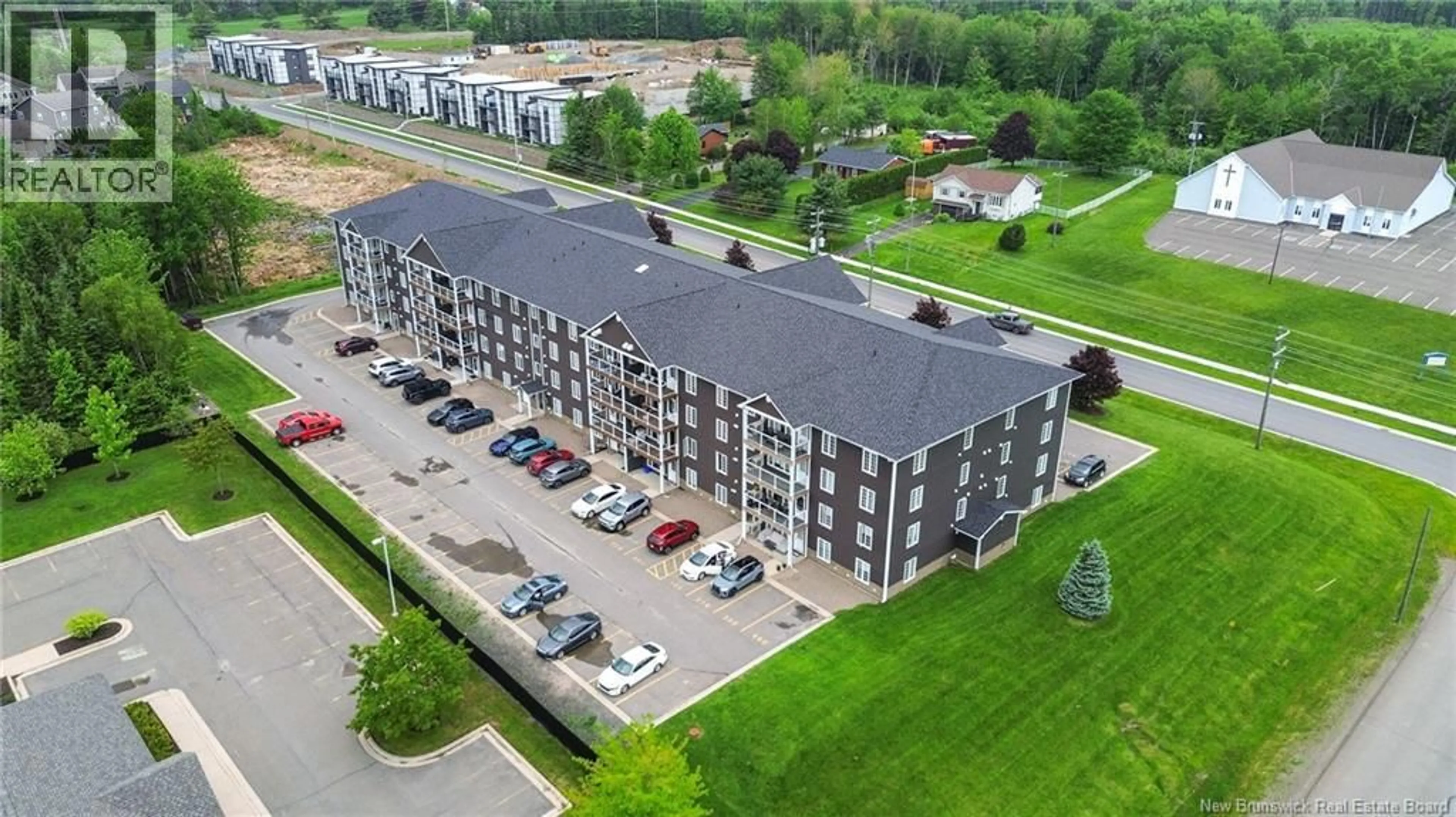 A pic from outside/outdoor area/front of a property/back of a property/a pic from drone, building for 330 - 225 SERENITY LANE LANE, Fredericton New Brunswick E3B0H1
