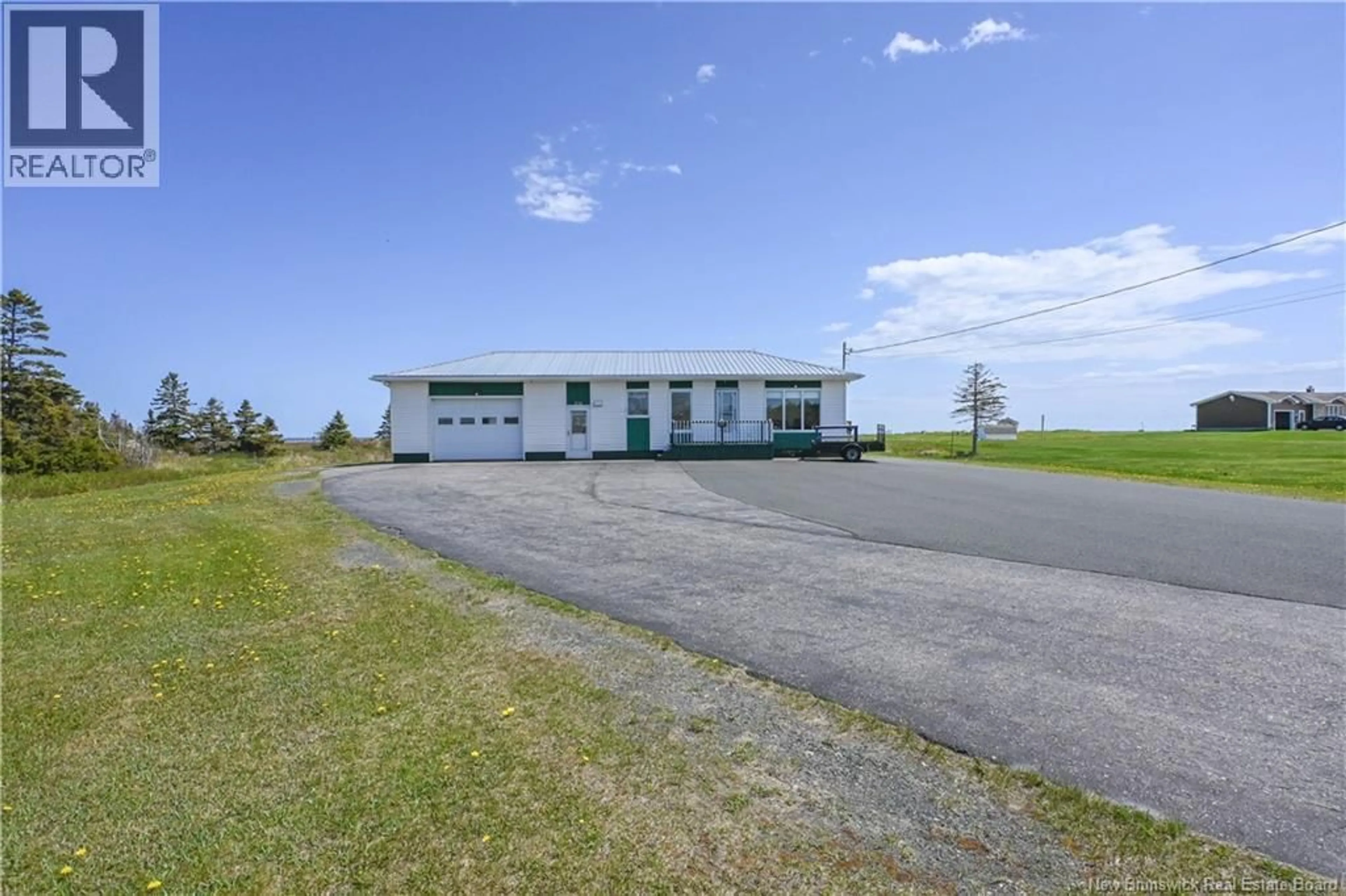 A pic from outside/outdoor area/front of a property/back of a property/a pic from drone, building for 1518 DE LA MER BOULEVARD, Saint-Marie-Saint-Raphaël New Brunswick E8T1P3