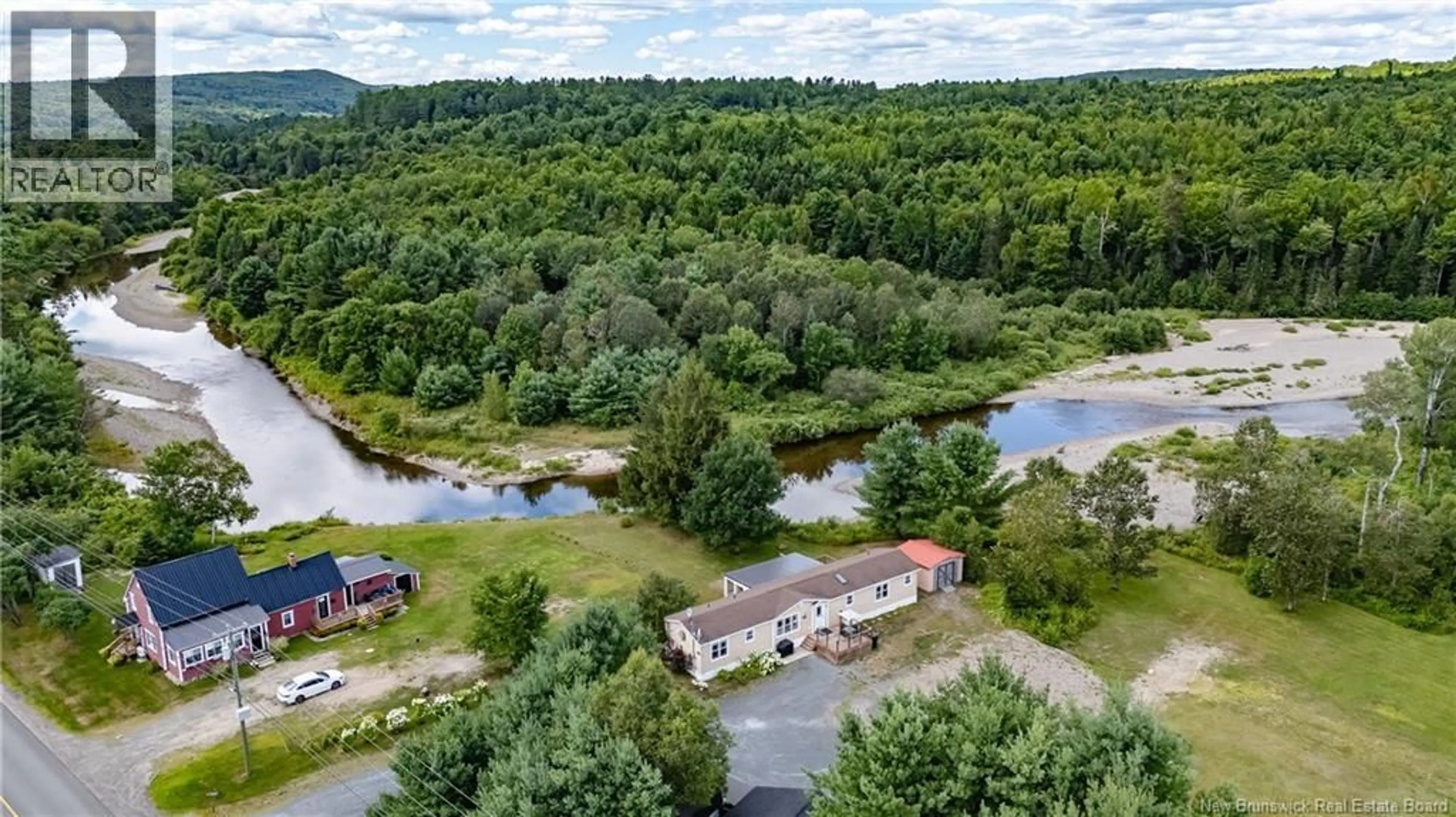 A pic from outside/outdoor area/front of a property/back of a property/a pic from drone, water/lake/river/ocean view for 1334 ROUTE 104, Keswick New Brunswick E4L2G7