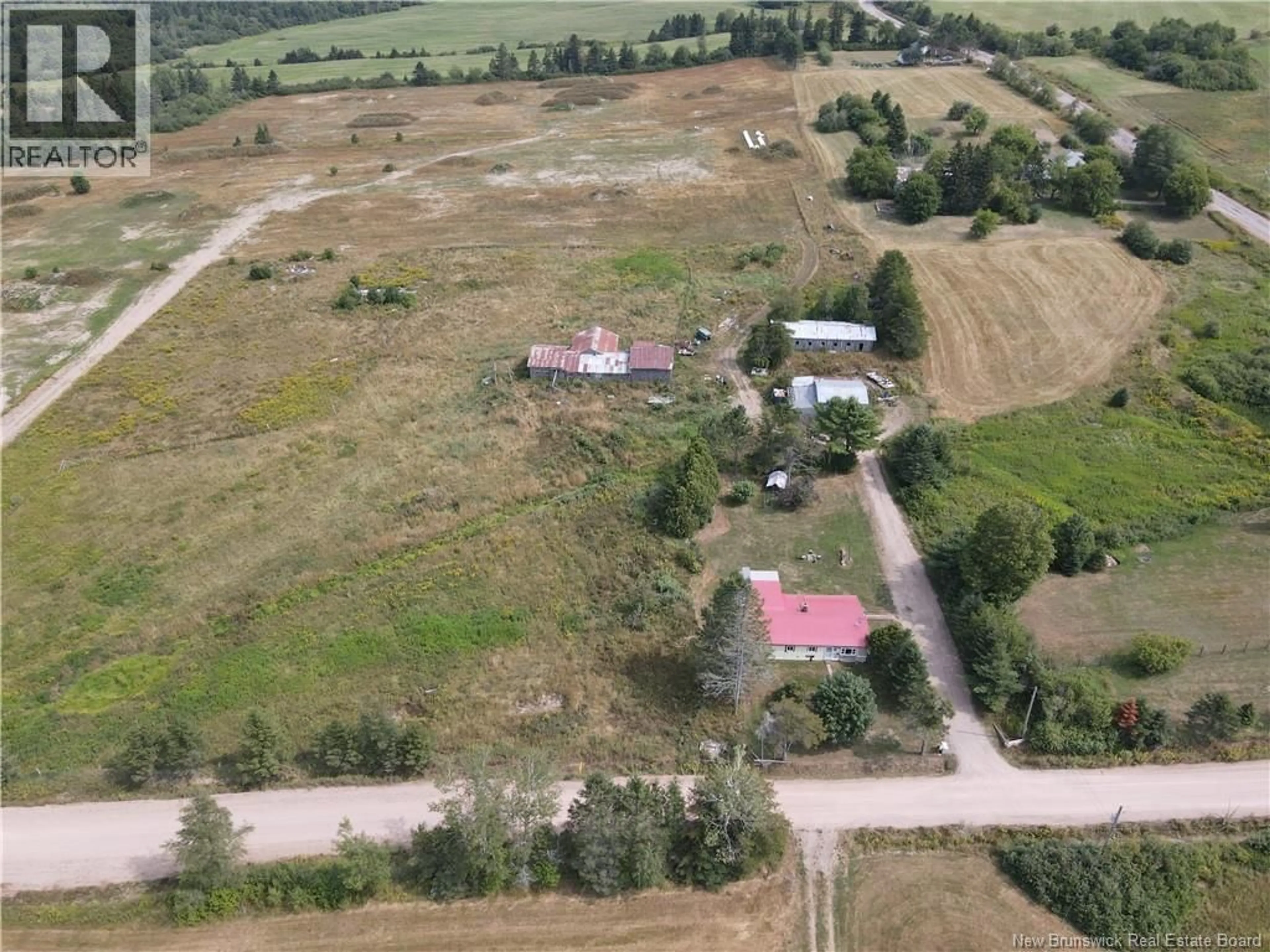 A pic from outside/outdoor area/front of a property/back of a property/a pic from drone, building for 18 DICKIE ROAD, Cornhill New Brunswick E4Z1K5