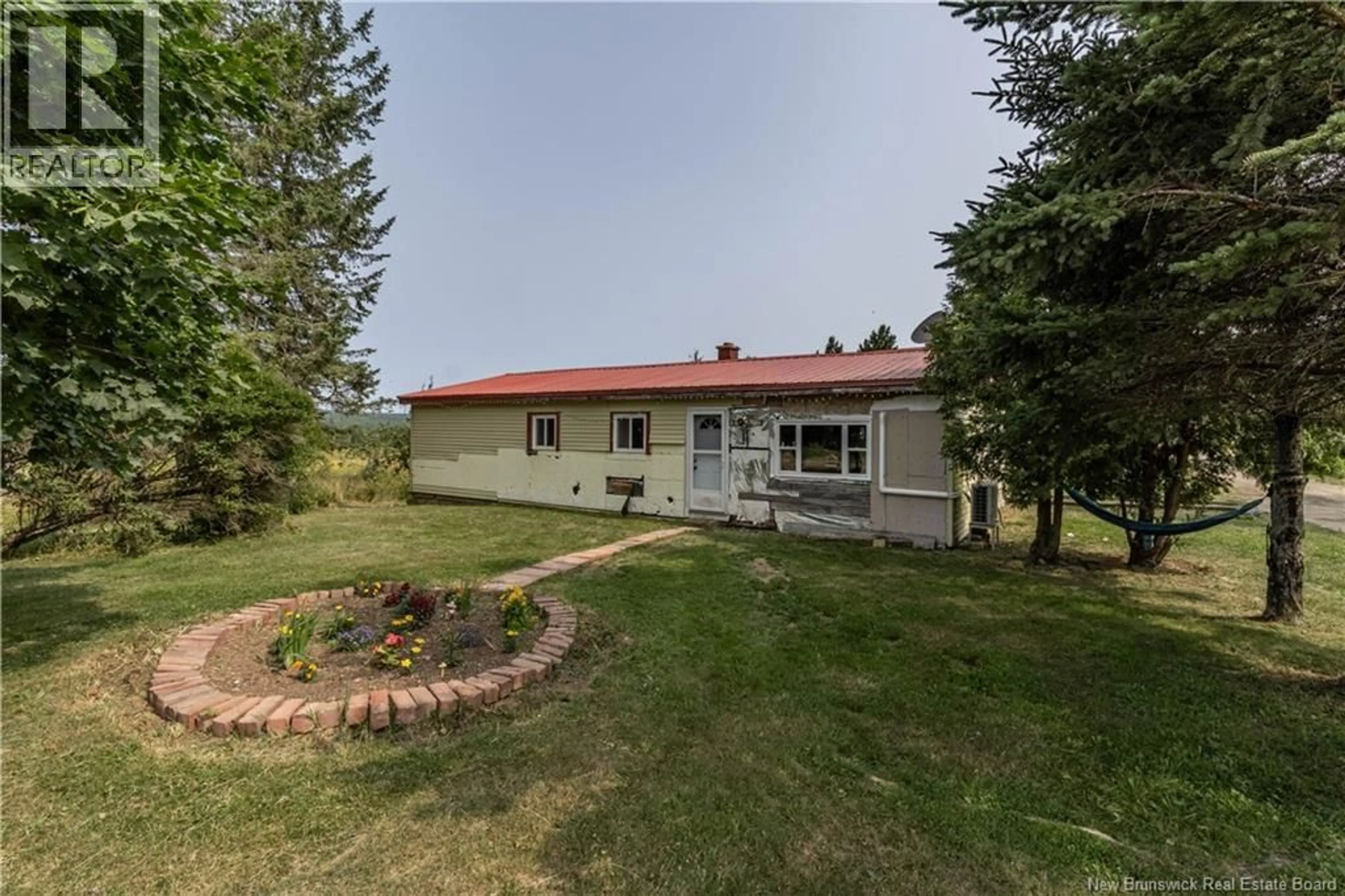 A pic from outside/outdoor area/front of a property/back of a property/a pic from drone, unknown for 18 DICKIE ROAD, Cornhill New Brunswick E4Z1K5