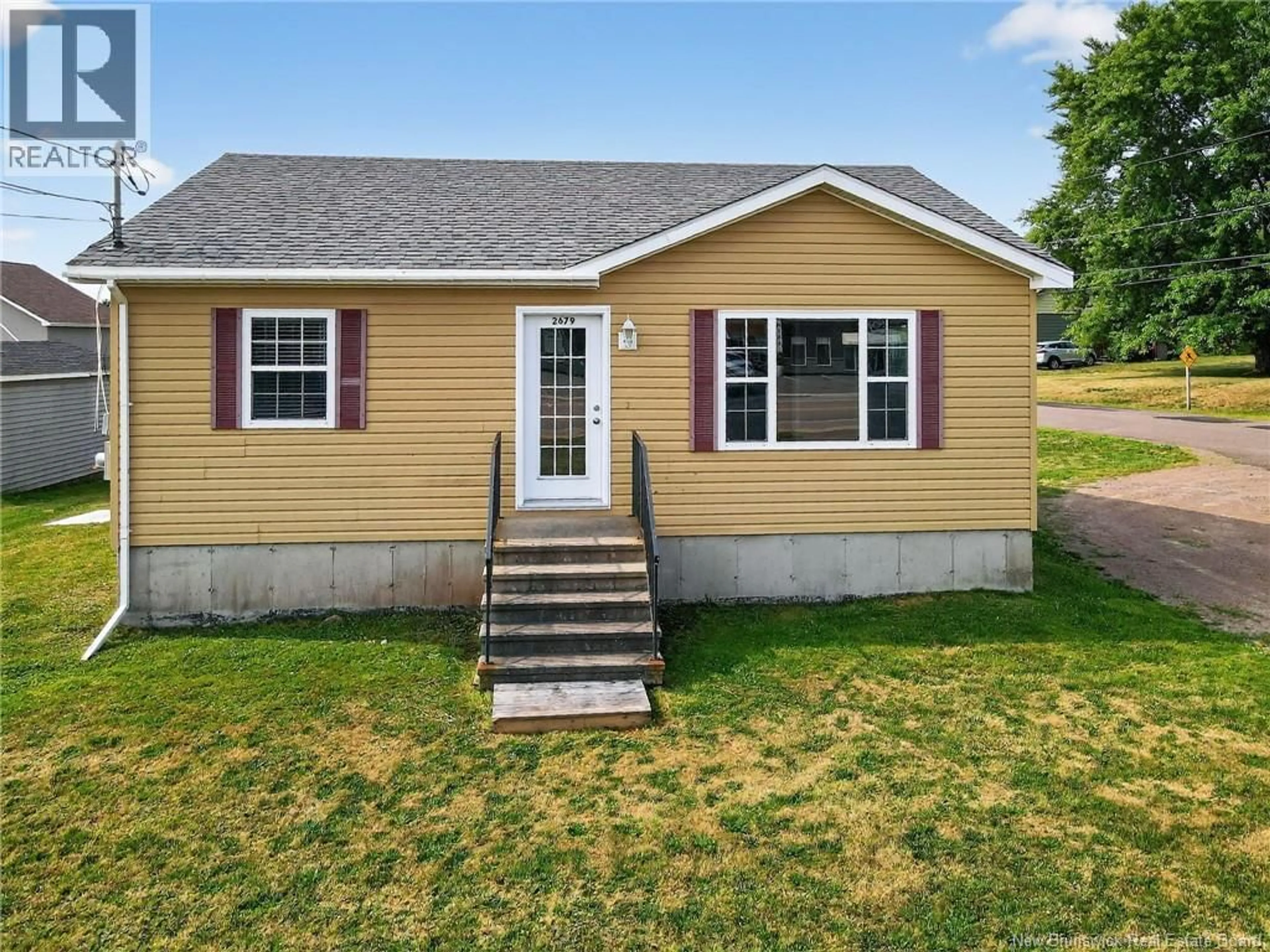 Home with vinyl exterior material, street for 2679 ACADIE ROAD, Cap-Pelé New Brunswick E4N1C3