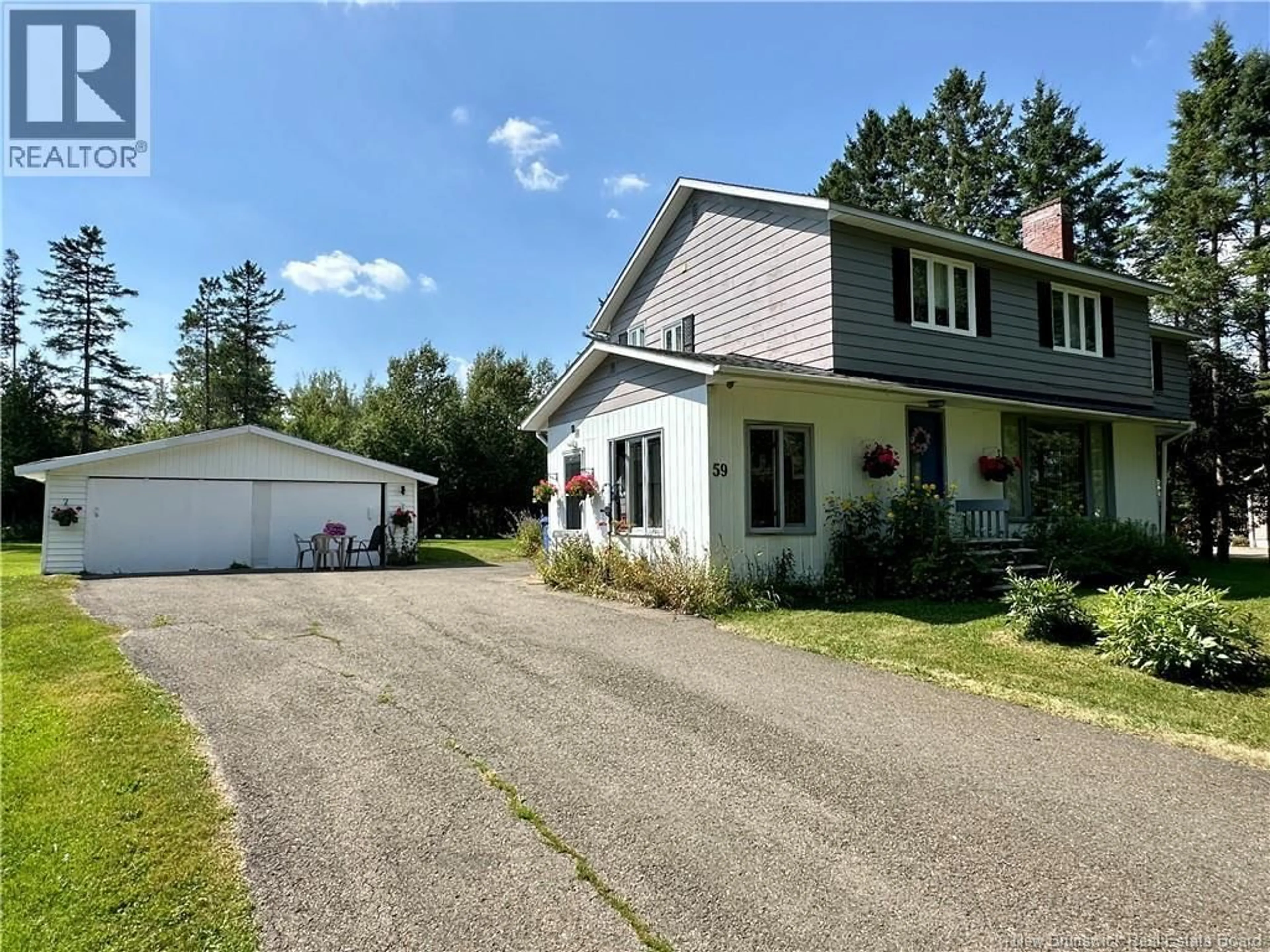 A pic from outside/outdoor area/front of a property/back of a property/a pic from drone, street for 59 HILLCREST STREET, Plaster Rock New Brunswick E7G1V2