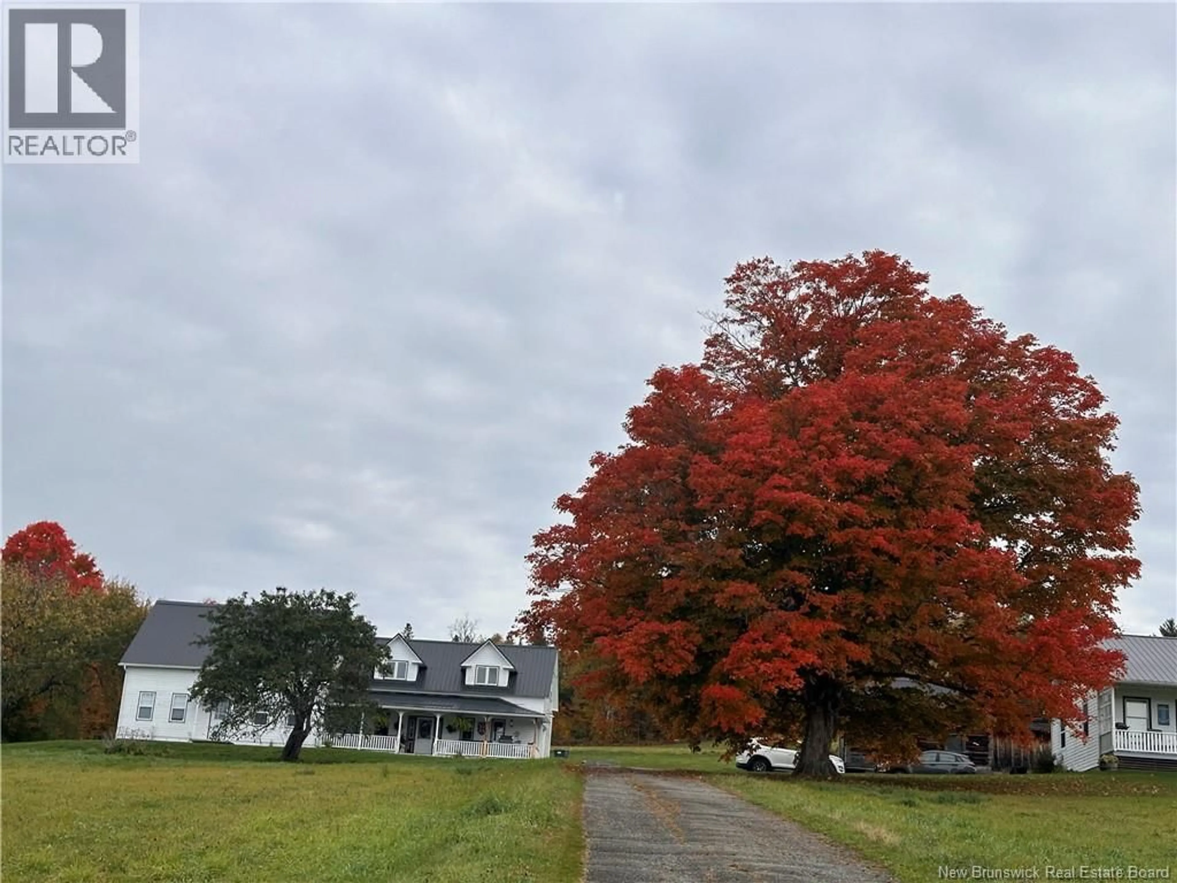 A pic from outside/outdoor area/front of a property/back of a property/a pic from drone, street for 4790 ROUTE 105, Upper Queensbury New Brunswick E6G1W6