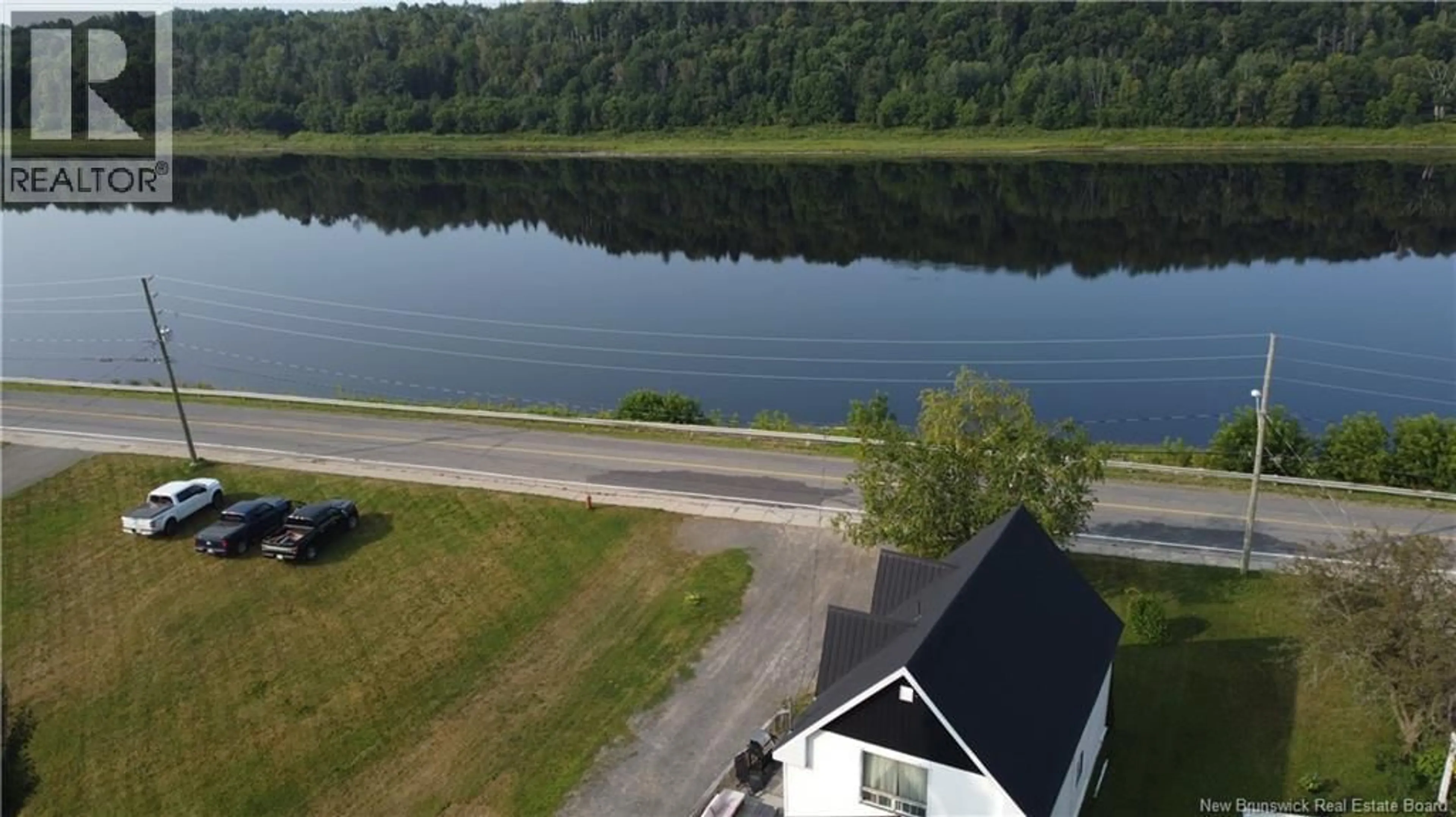 A pic from outside/outdoor area/front of a property/back of a property/a pic from drone, water/lake/river/ocean view for 166 MAIN STREET, Hartland New Brunswick E7P2M5