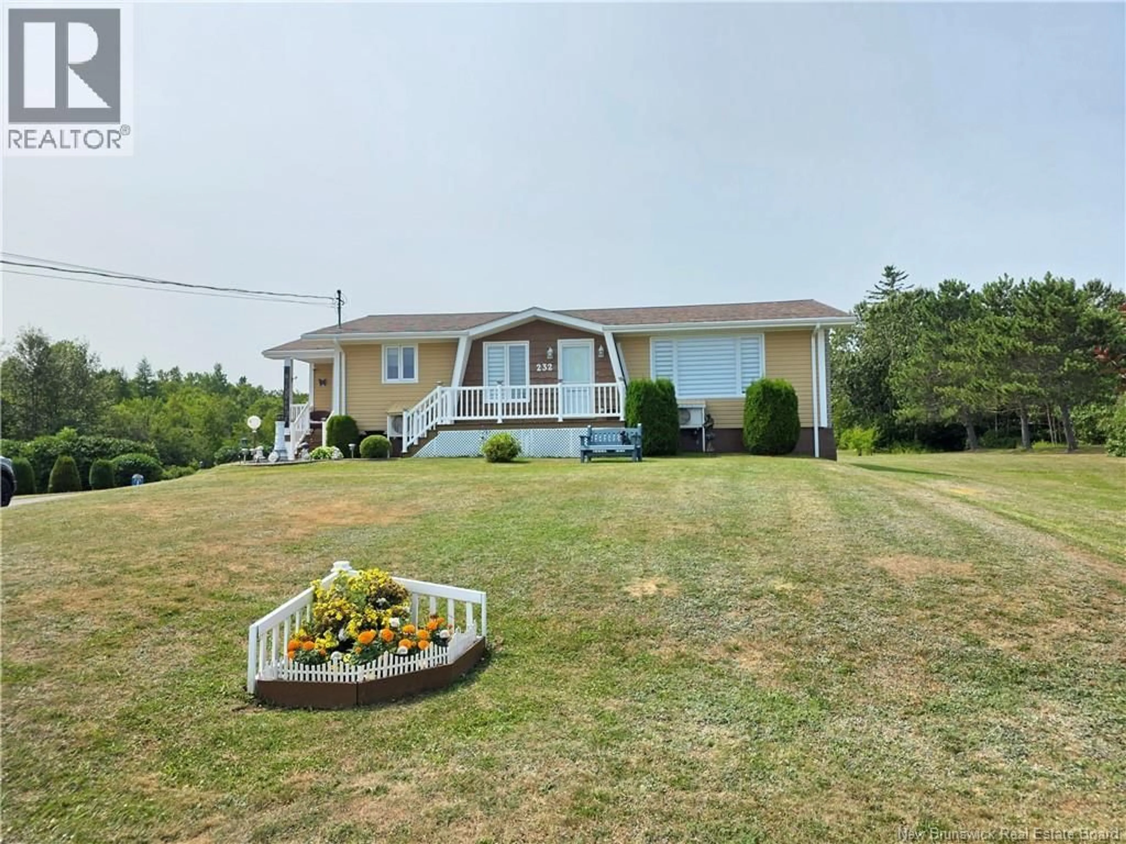 A pic from outside/outdoor area/front of a property/back of a property/a pic from drone, unknown for 232 RTE 134, Petit-Rocher-Nord New Brunswick E8J3B2