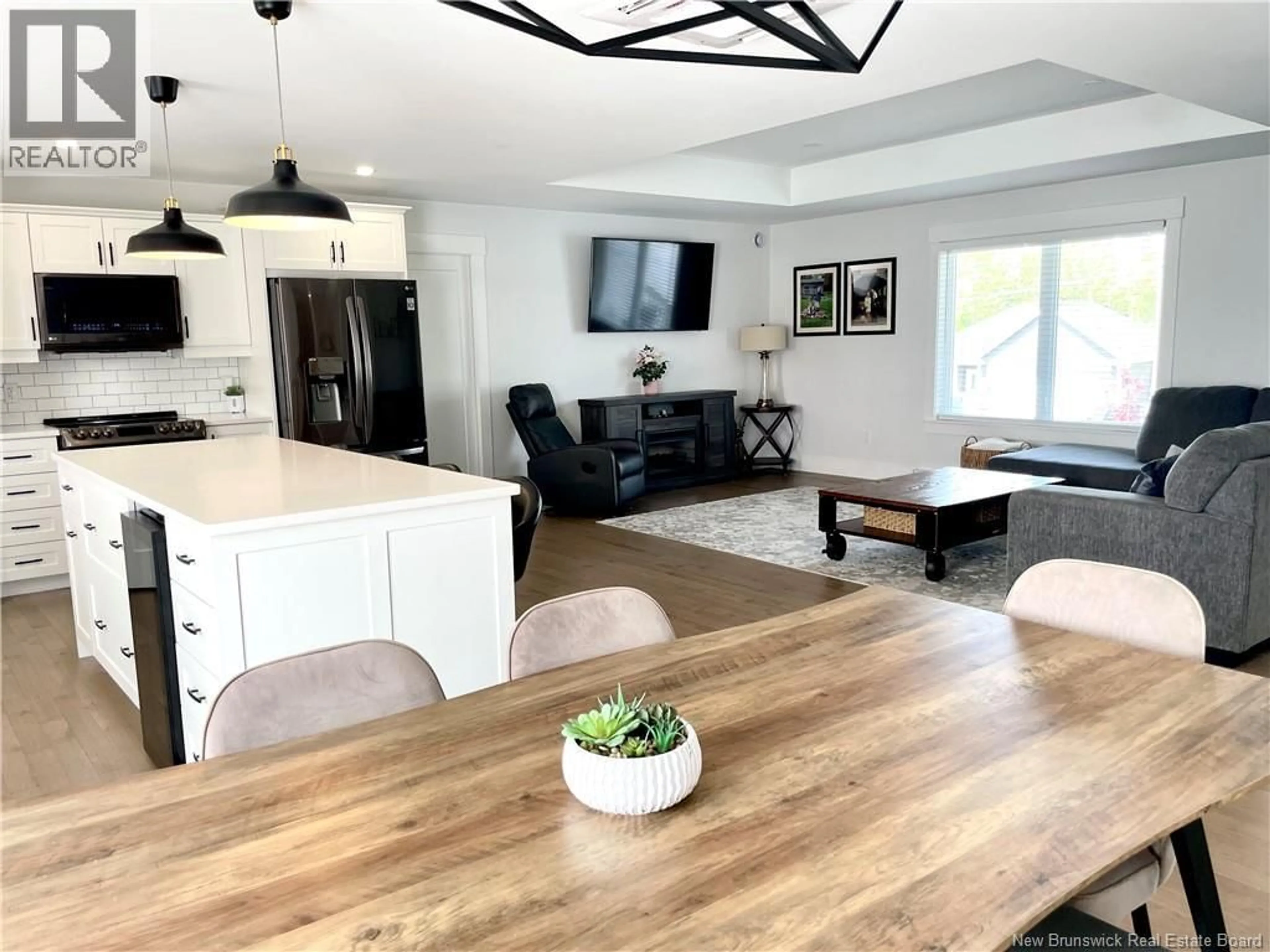 Open concept kitchen, wood/laminate floor for 24 FLAGSTONE DRIVE, Quispamsis New Brunswick E2G0B6