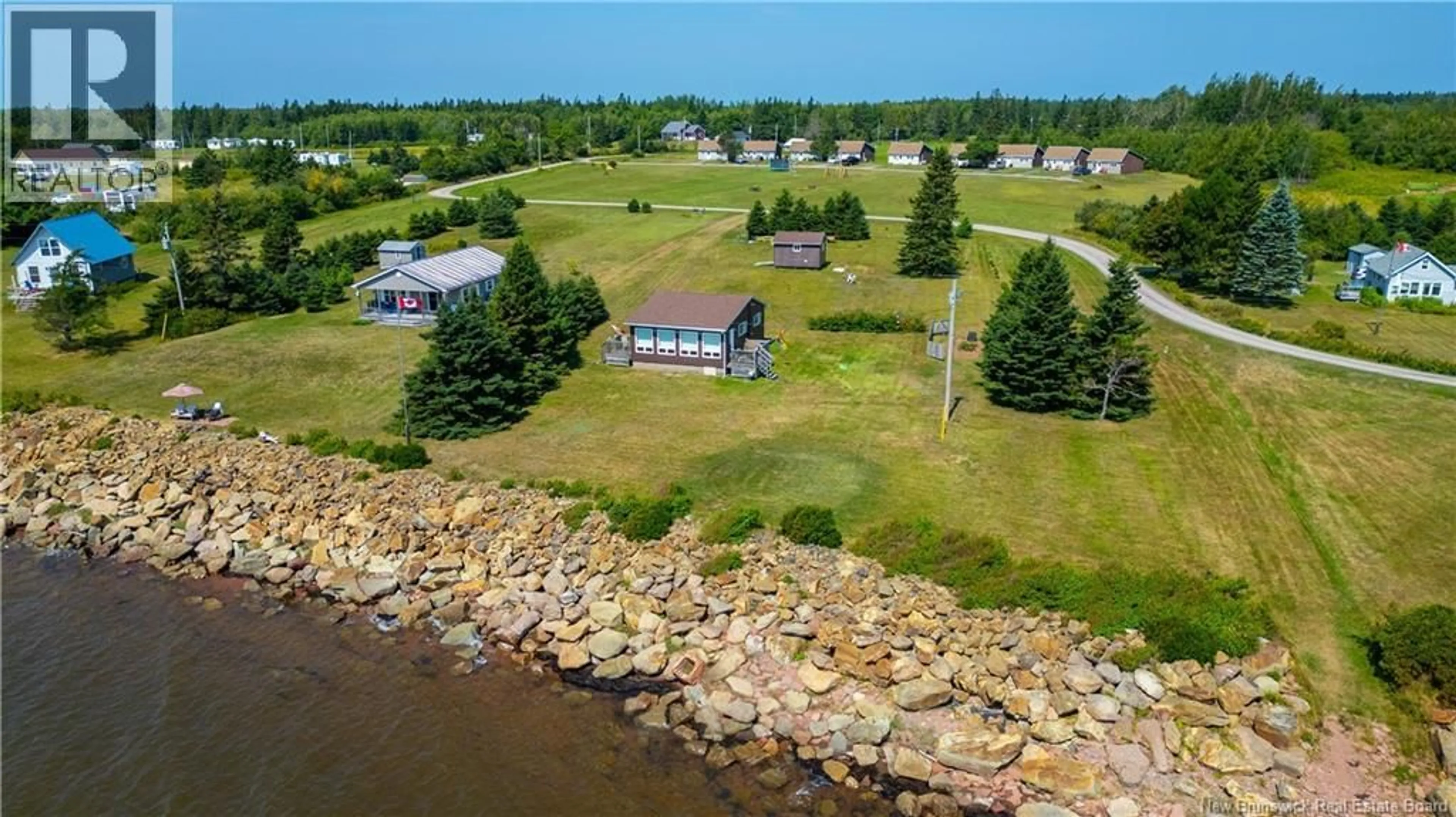 A pic from outside/outdoor area/front of a property/back of a property/a pic from drone, water/lake/river/ocean view for 80 MONASH LANE, Cape Spear New Brunswick E4M2R9