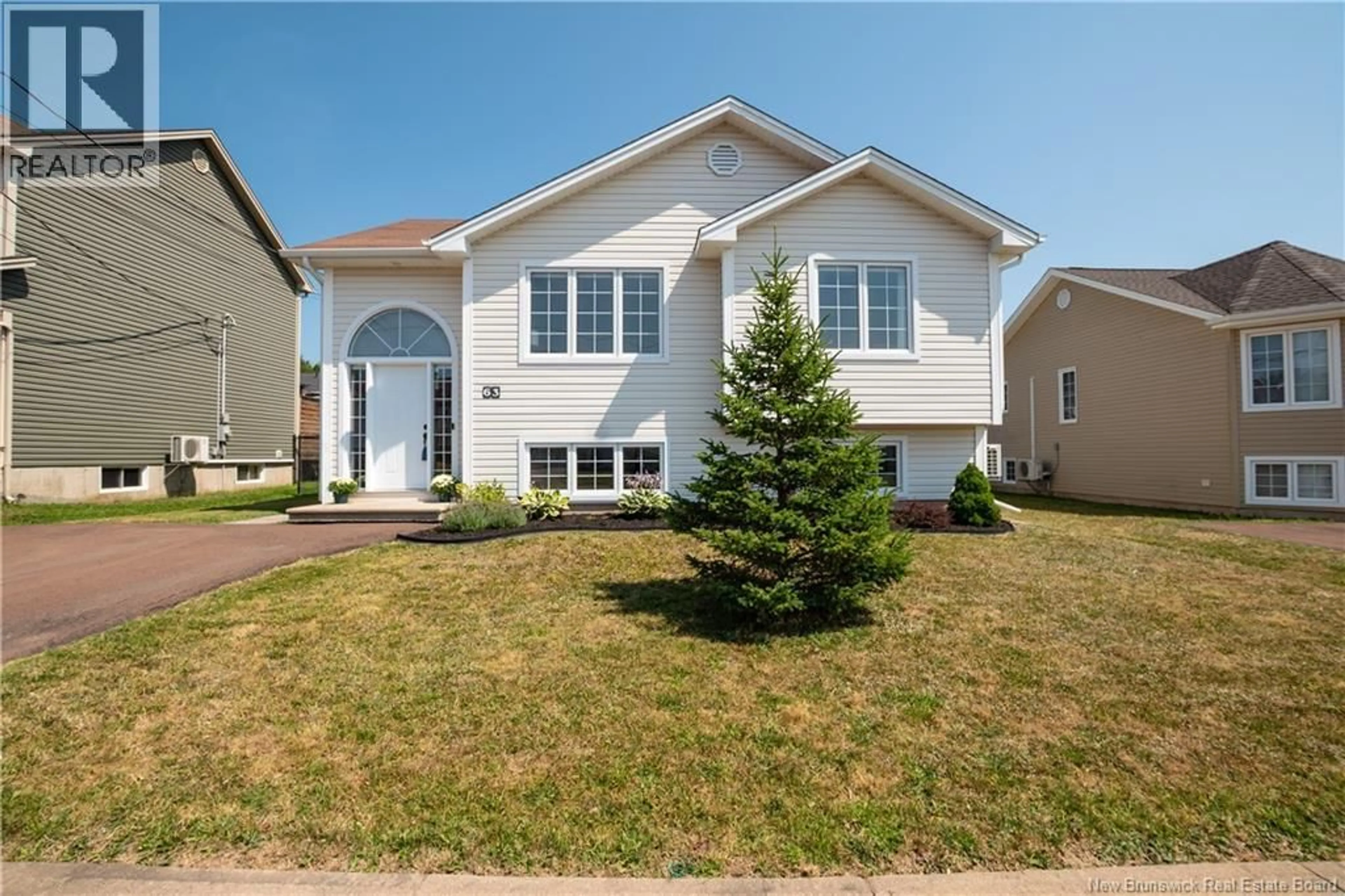 Home with vinyl exterior material, street for 63 MONIQUE STREET, Moncton New Brunswick E1G0R3