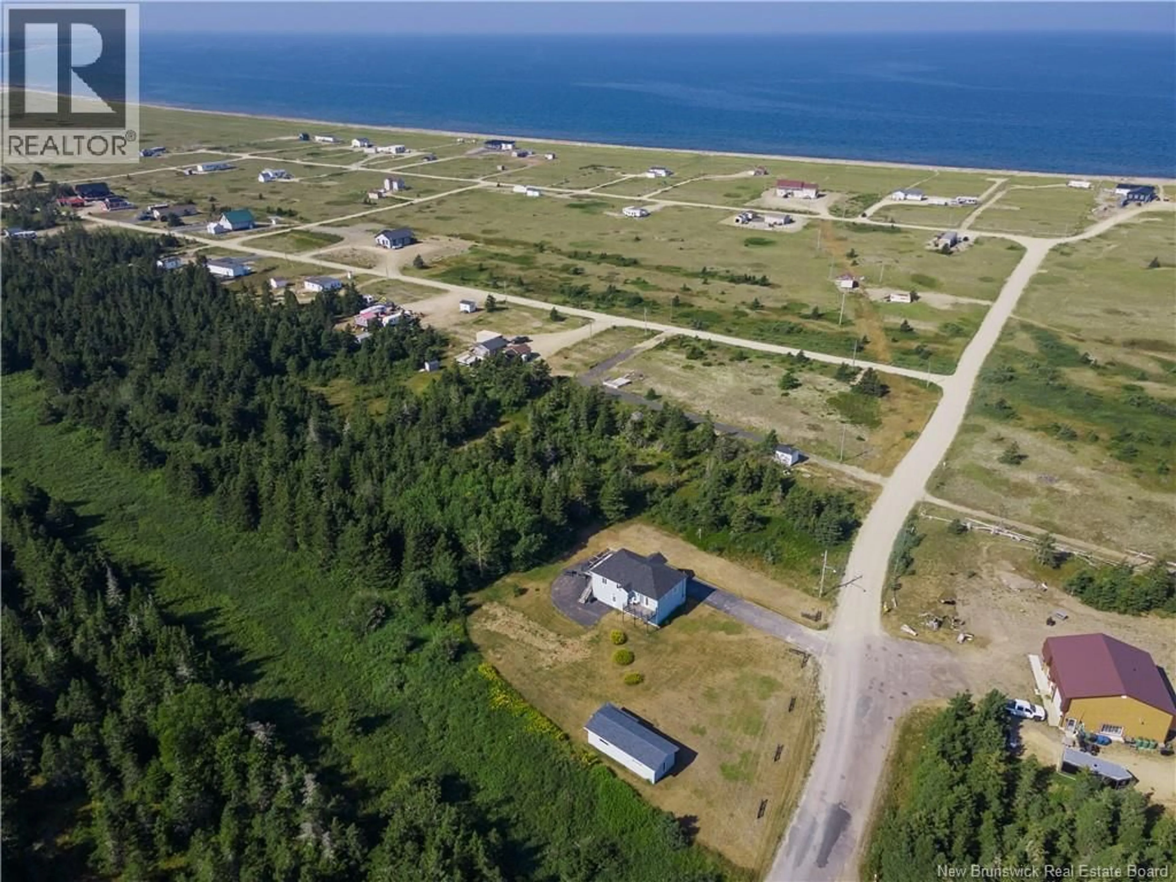 A pic from outside/outdoor area/front of a property/back of a property/a pic from drone, water/lake/river/ocean view for 181 WARD ROAD, Miscou New Brunswick E8T2G5