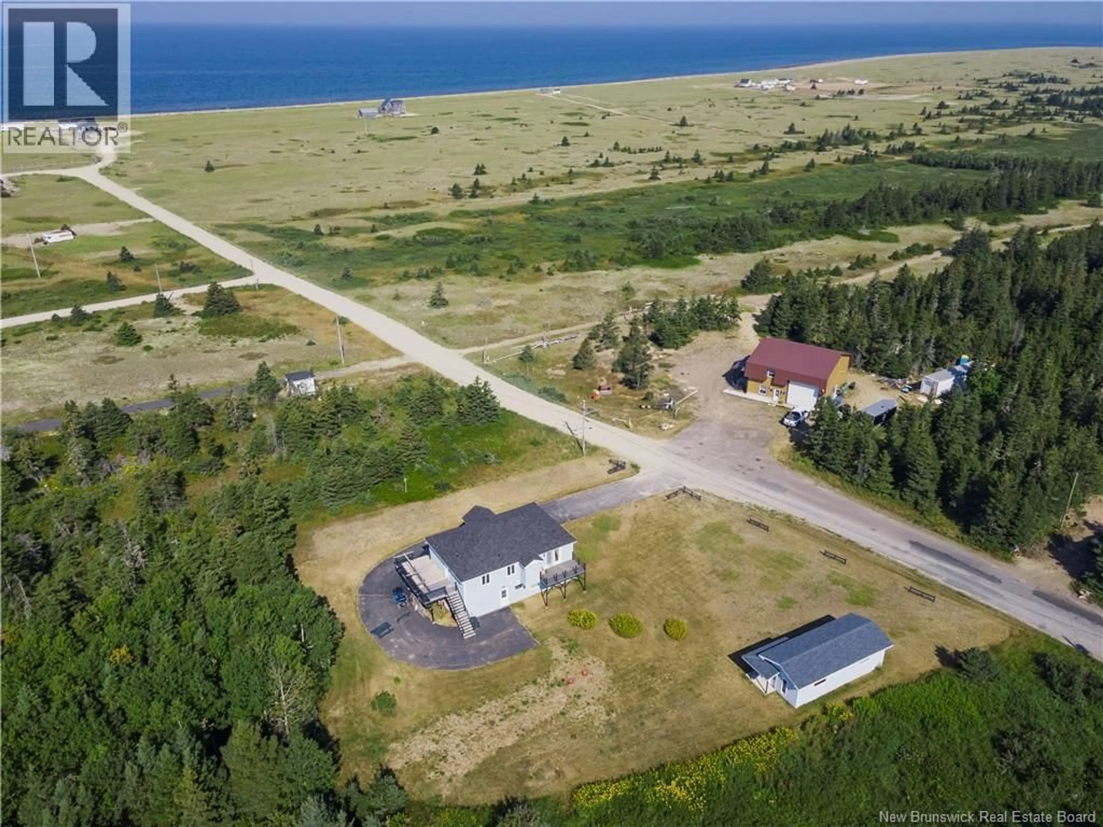 A pic from outside/outdoor area/front of a property/back of a property/a pic from drone, water/lake/river/ocean view for 181 WARD ROAD, Miscou New Brunswick E8T2G5