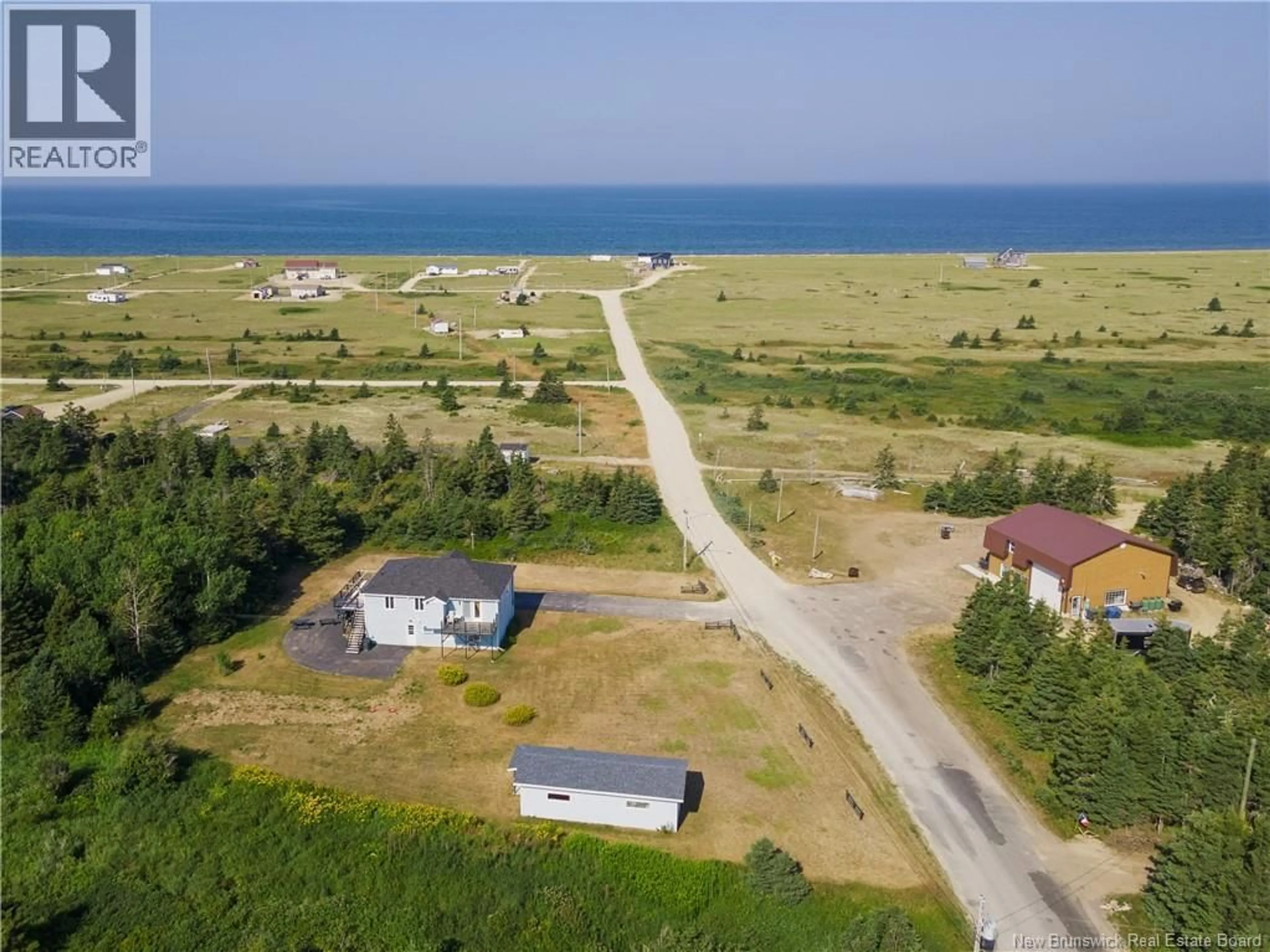 A pic from outside/outdoor area/front of a property/back of a property/a pic from drone, water/lake/river/ocean view for 181 WARD ROAD, Miscou New Brunswick E8T2G5