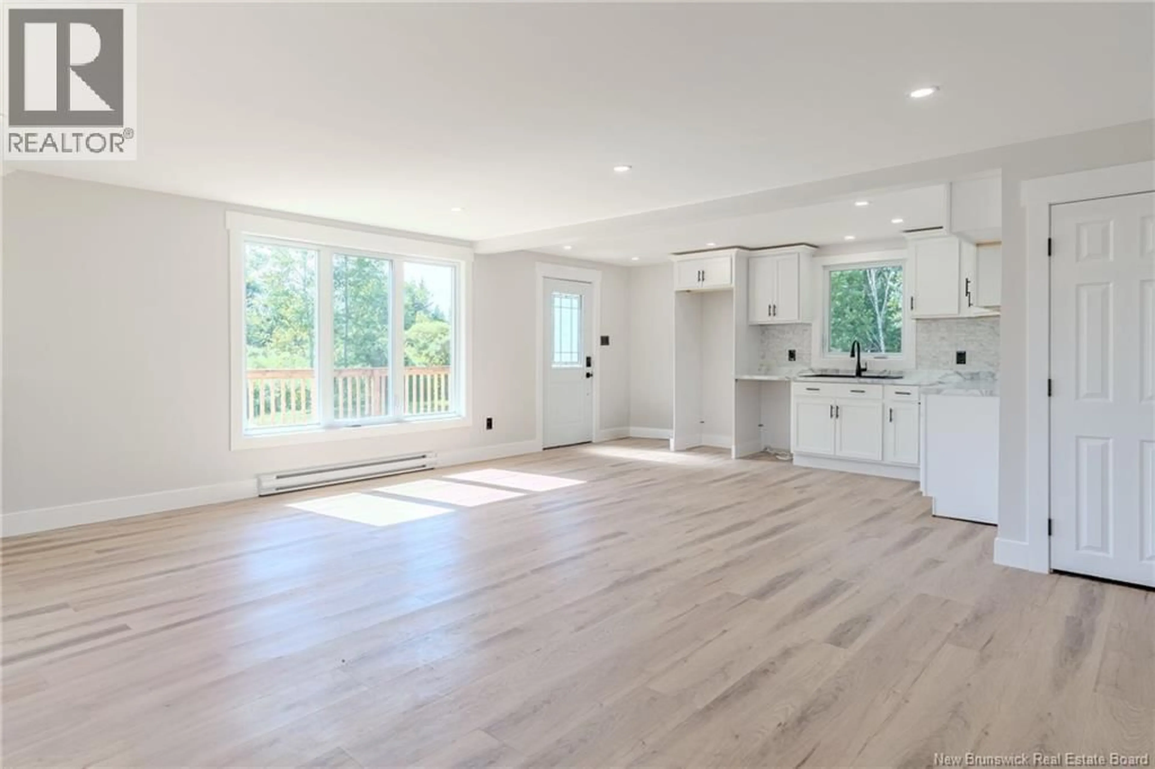 Open concept kitchen, wood/laminate floor for 2983 ROUTE 790, Musquash New Brunswick E5J2E8