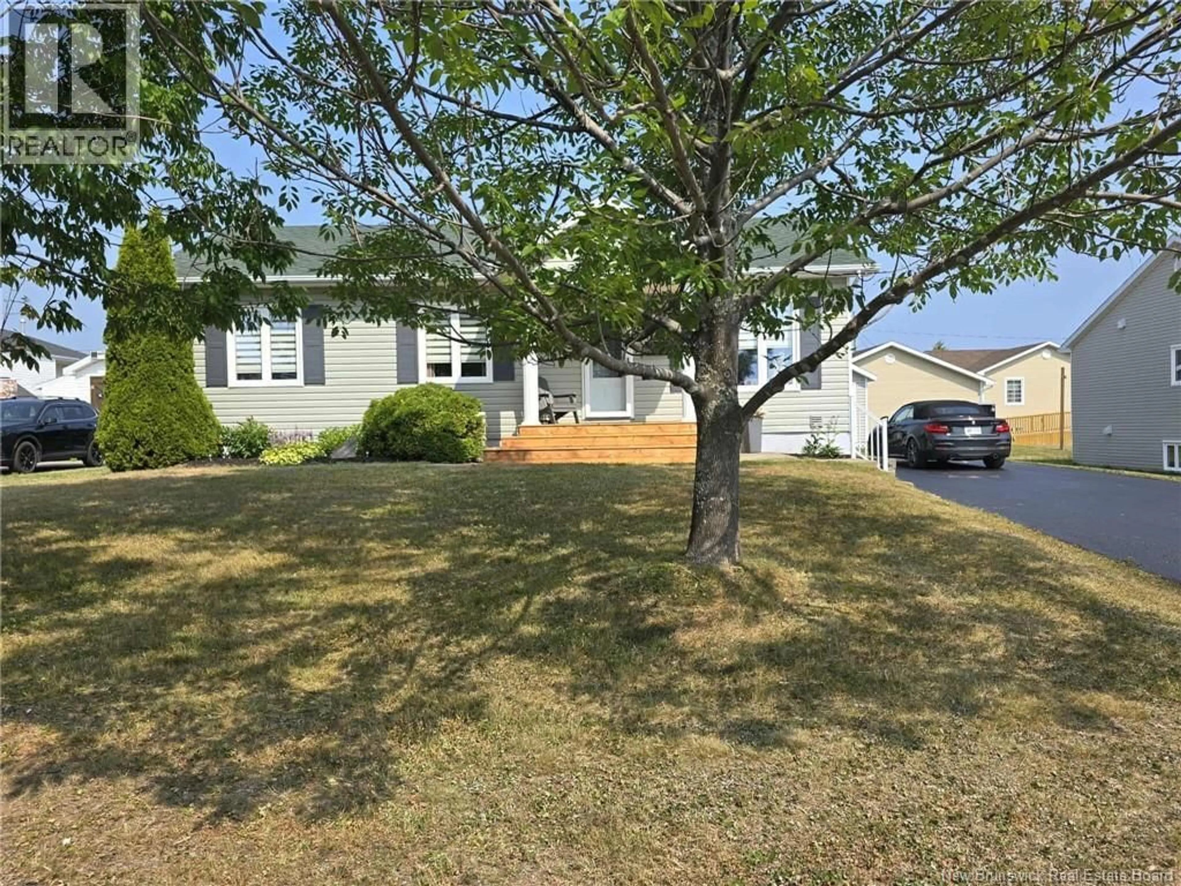 A pic from outside/outdoor area/front of a property/back of a property/a pic from drone, street for 461 MSGR RICHARD STREET, Beresford New Brunswick E8K1Z1