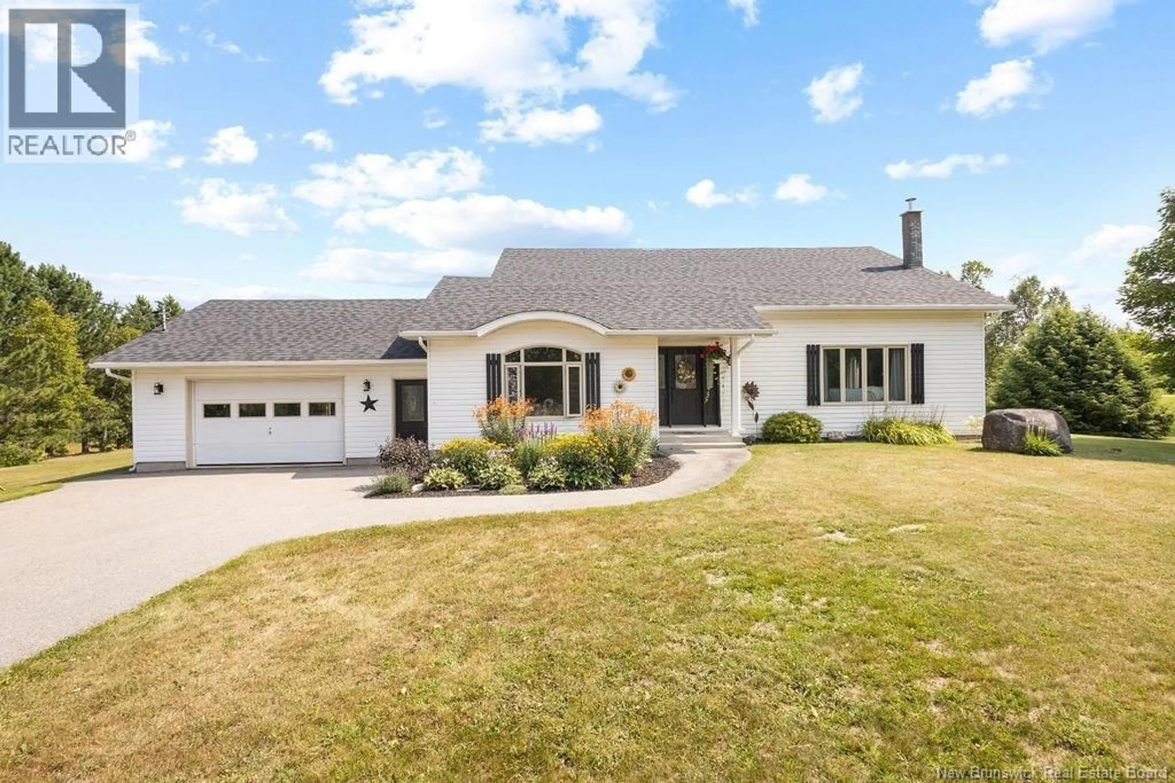 Home with vinyl exterior material, street for 11399 ROUTE 126, Rogersville New Brunswick E4Y2N8