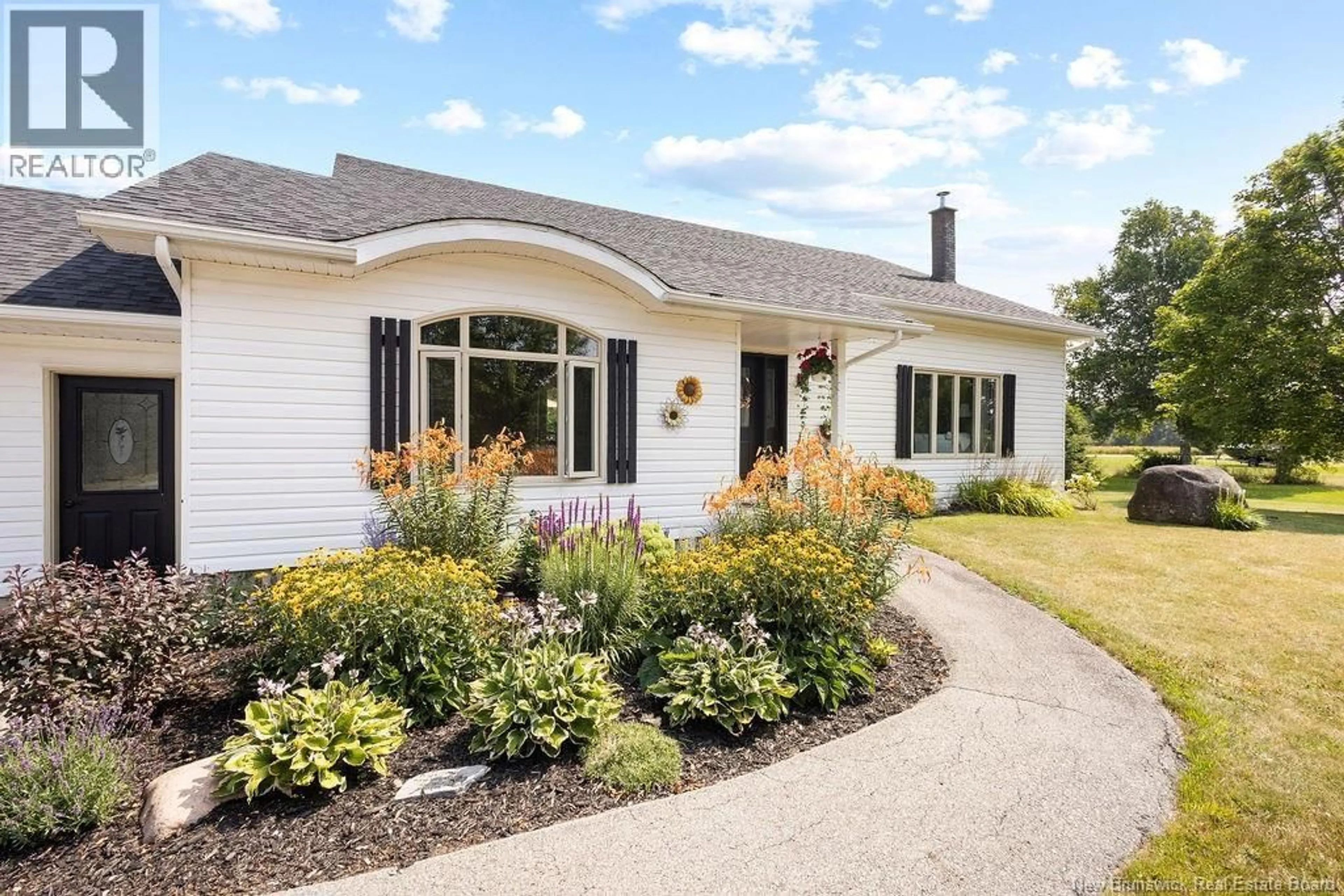 Home with vinyl exterior material, street for 11399 ROUTE 126, Rogersville New Brunswick E4Y2N8