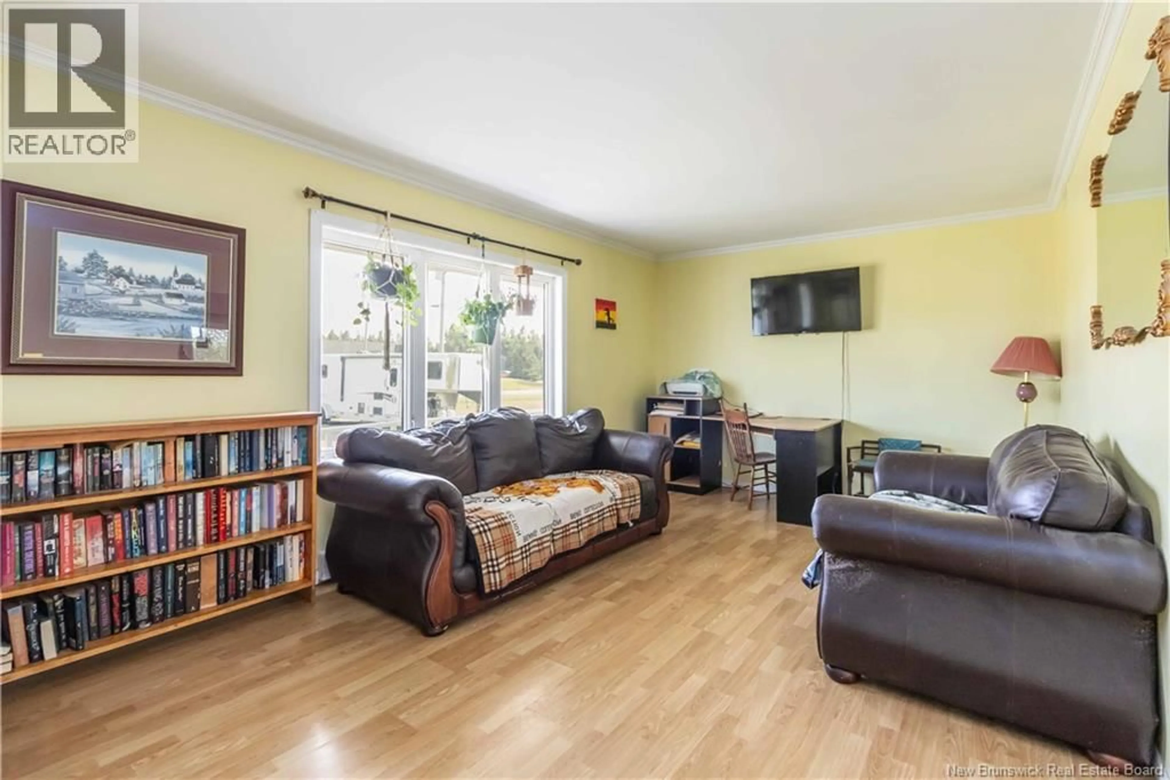 Living room with furniture, wood/laminate floor for 66 BRIGGS CROSS ROAD, Lutes Mountain New Brunswick E1G2X8
