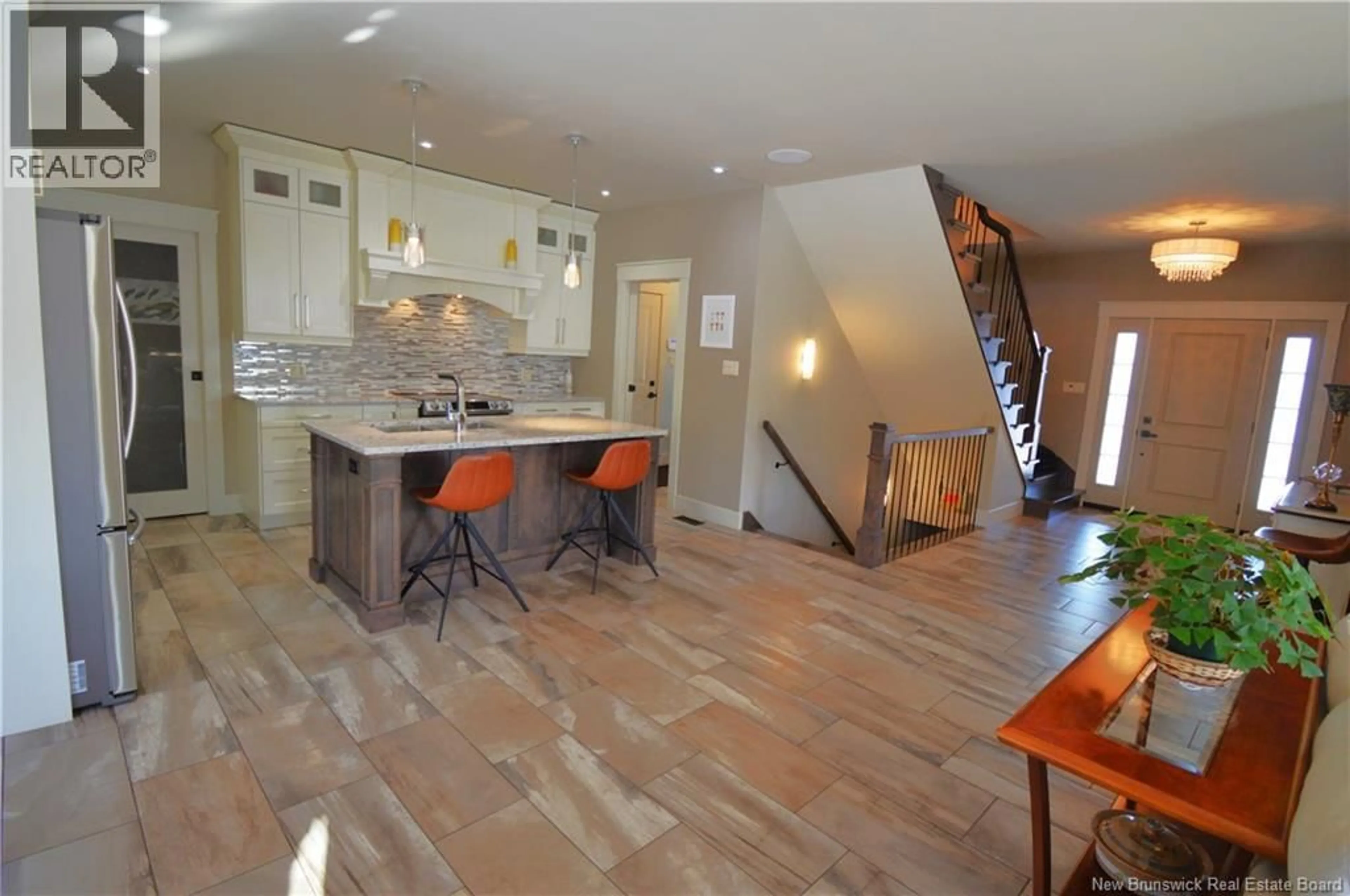 Open concept kitchen, ceramic/tile floor for 47 MONIQUE STREET, Shediac New Brunswick E4P0M5