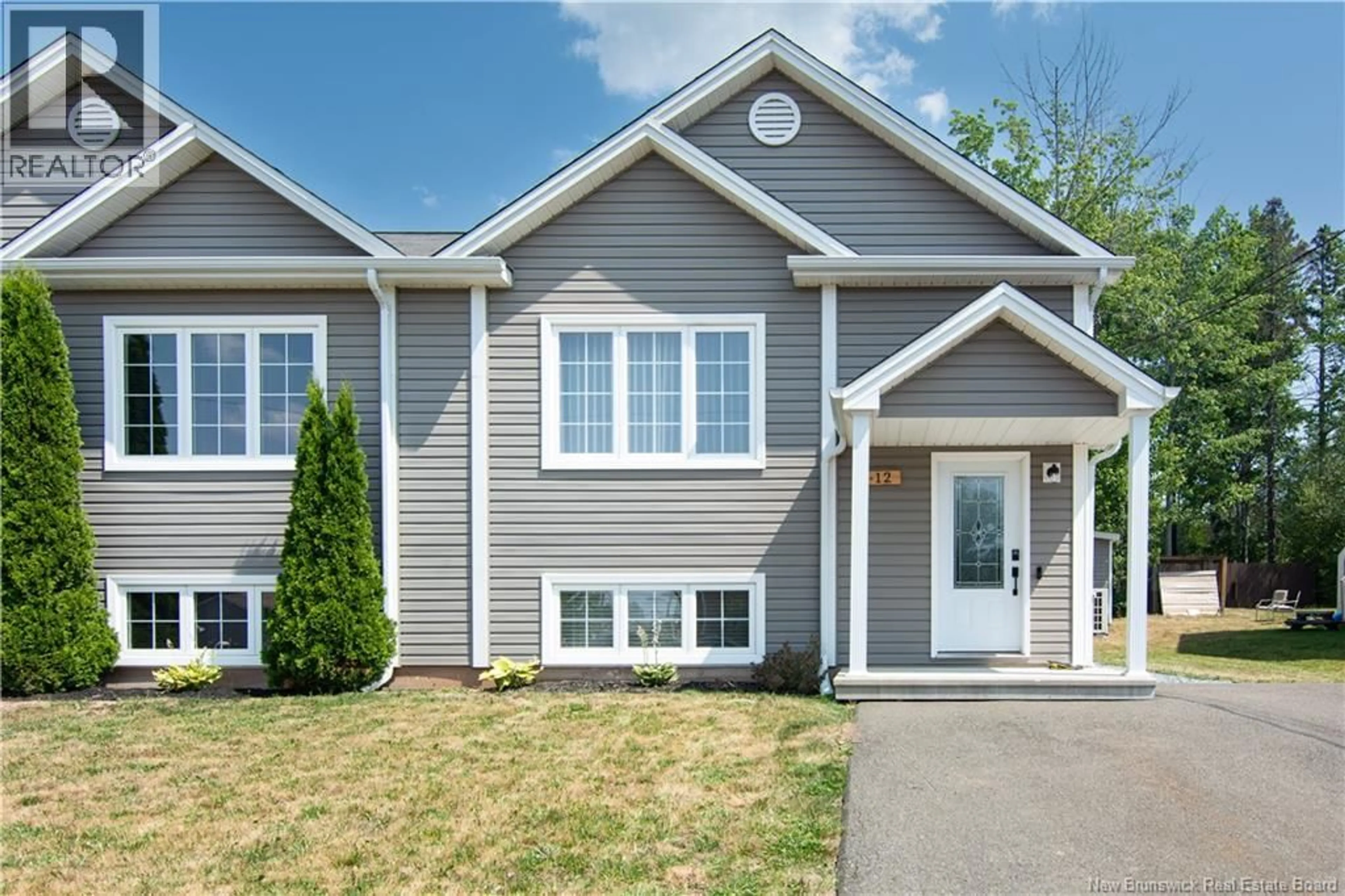 Home with vinyl exterior material, street for 12 DES PEUPLIERS STREET, Dieppe New Brunswick E1A9E1