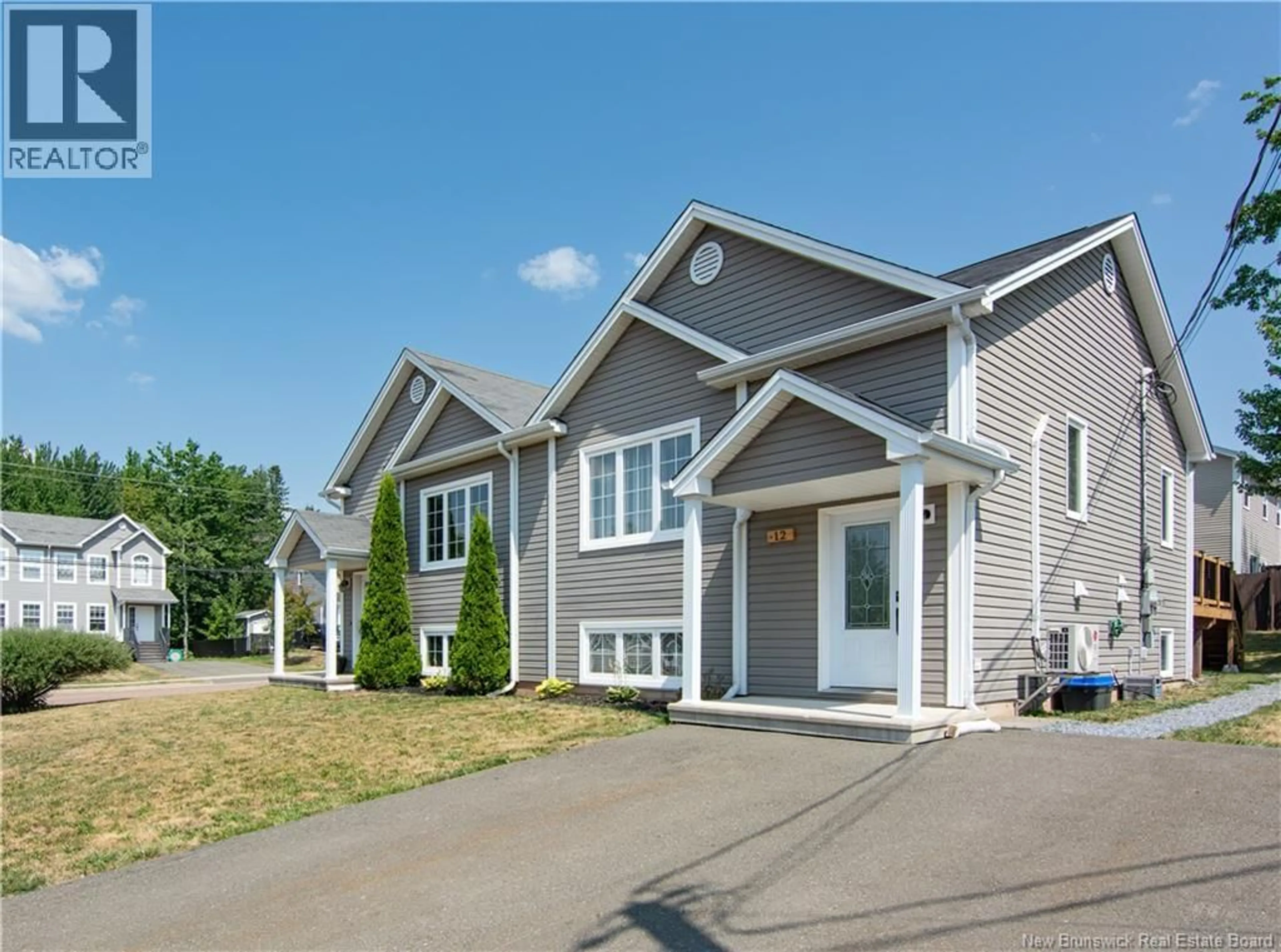 Home with vinyl exterior material, street for 12 DES PEUPLIERS STREET, Dieppe New Brunswick E1A9E1