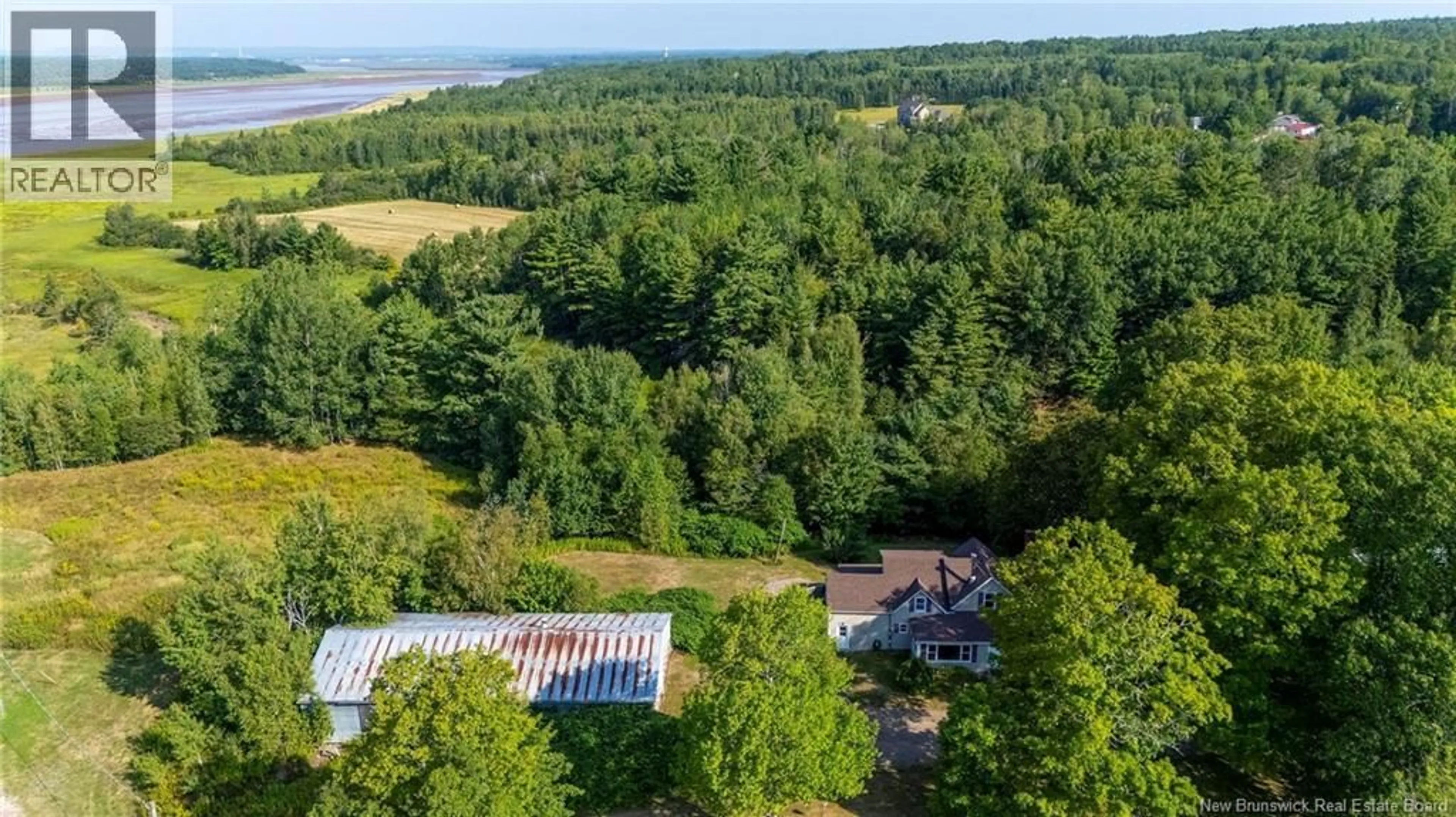 A pic from outside/outdoor area/front of a property/back of a property/a pic from drone, water/lake/river/ocean view for 22 PRINCIPALE STREET, Memramcook New Brunswick E4K1A6