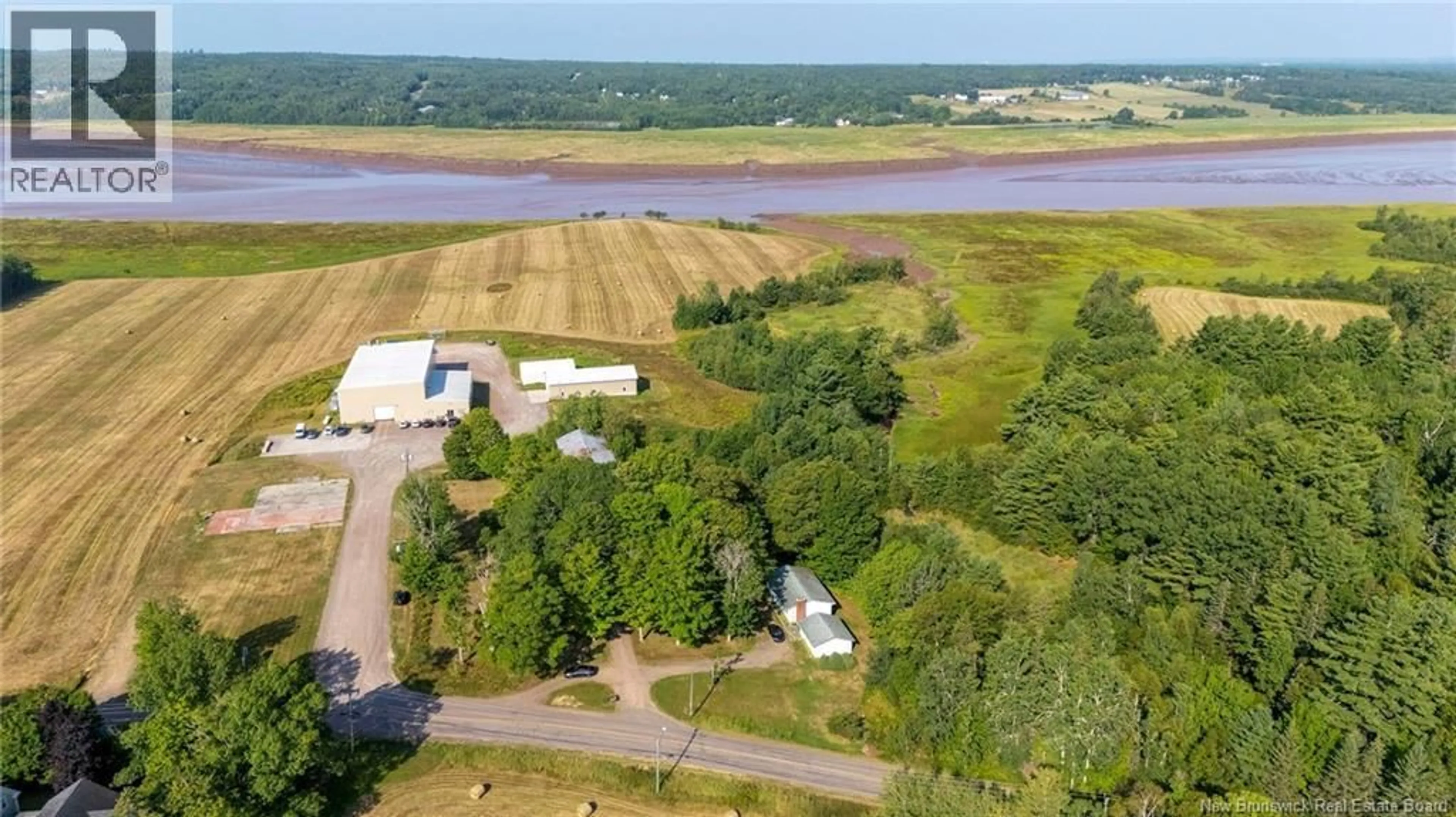A pic from outside/outdoor area/front of a property/back of a property/a pic from drone, water/lake/river/ocean view for 22 PRINCIPALE STREET, Memramcook New Brunswick E4K1A6