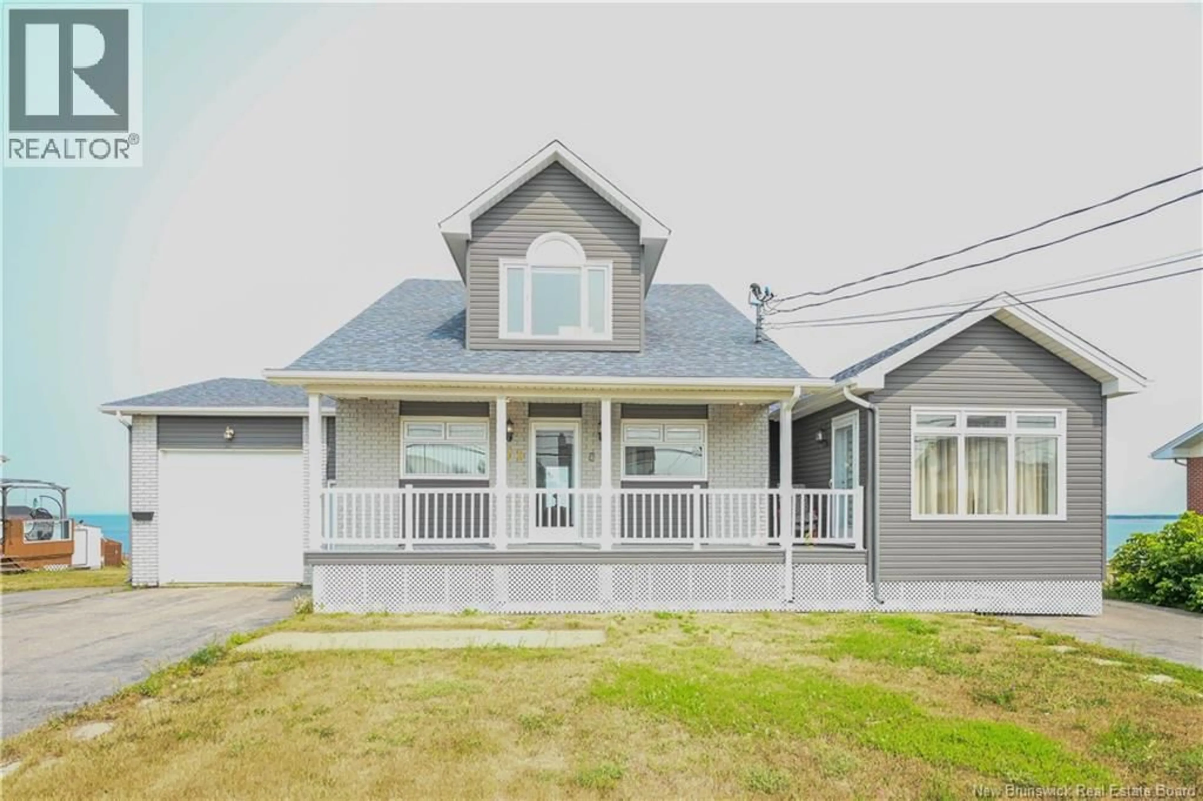 Home with vinyl exterior material, street for 171 SAINT-PIERRE BOULEVARD, Caraquet New Brunswick E1W1B1