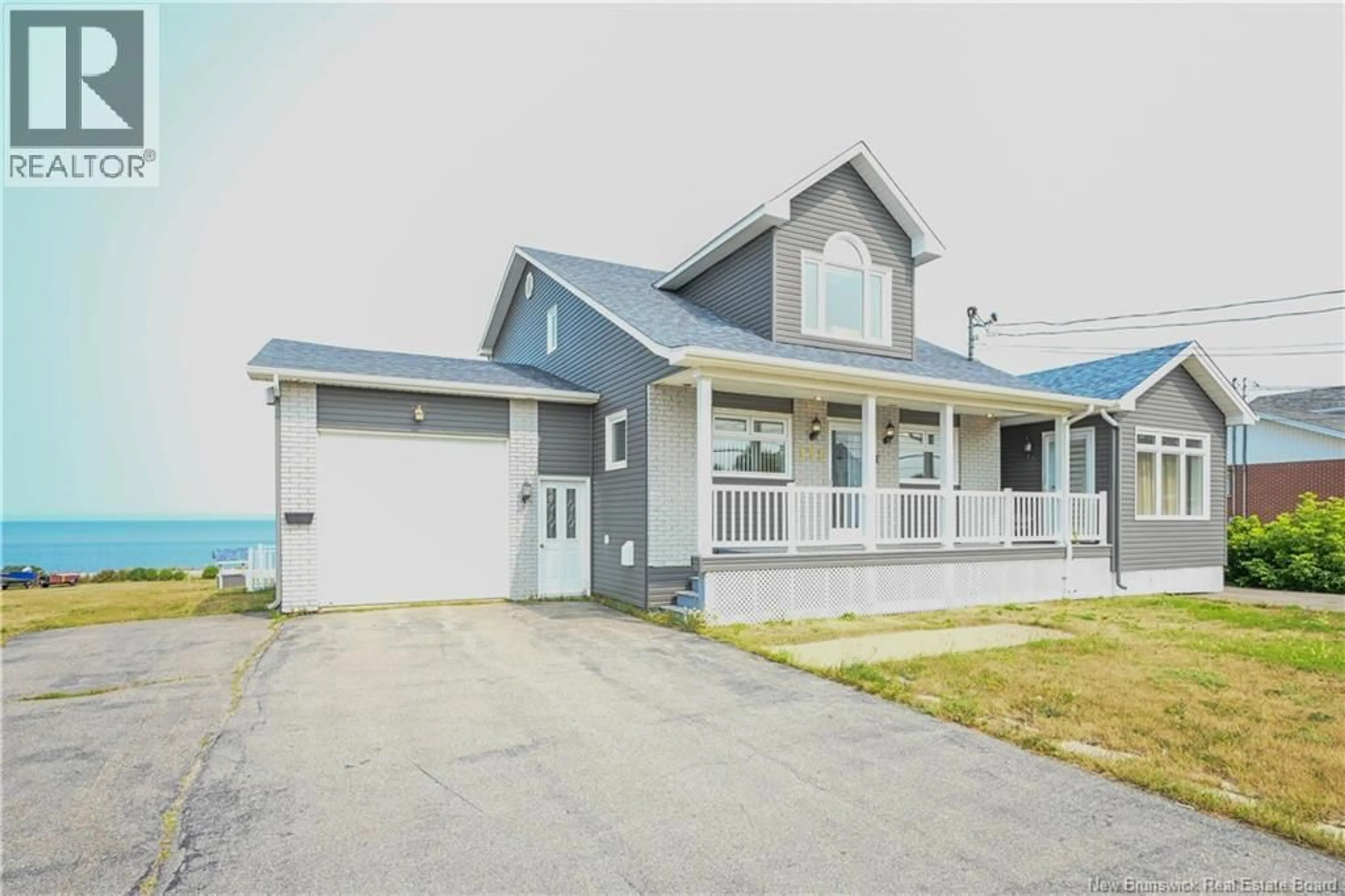 Home with vinyl exterior material, street for 171 SAINT-PIERRE BOULEVARD, Caraquet New Brunswick E1W1B1