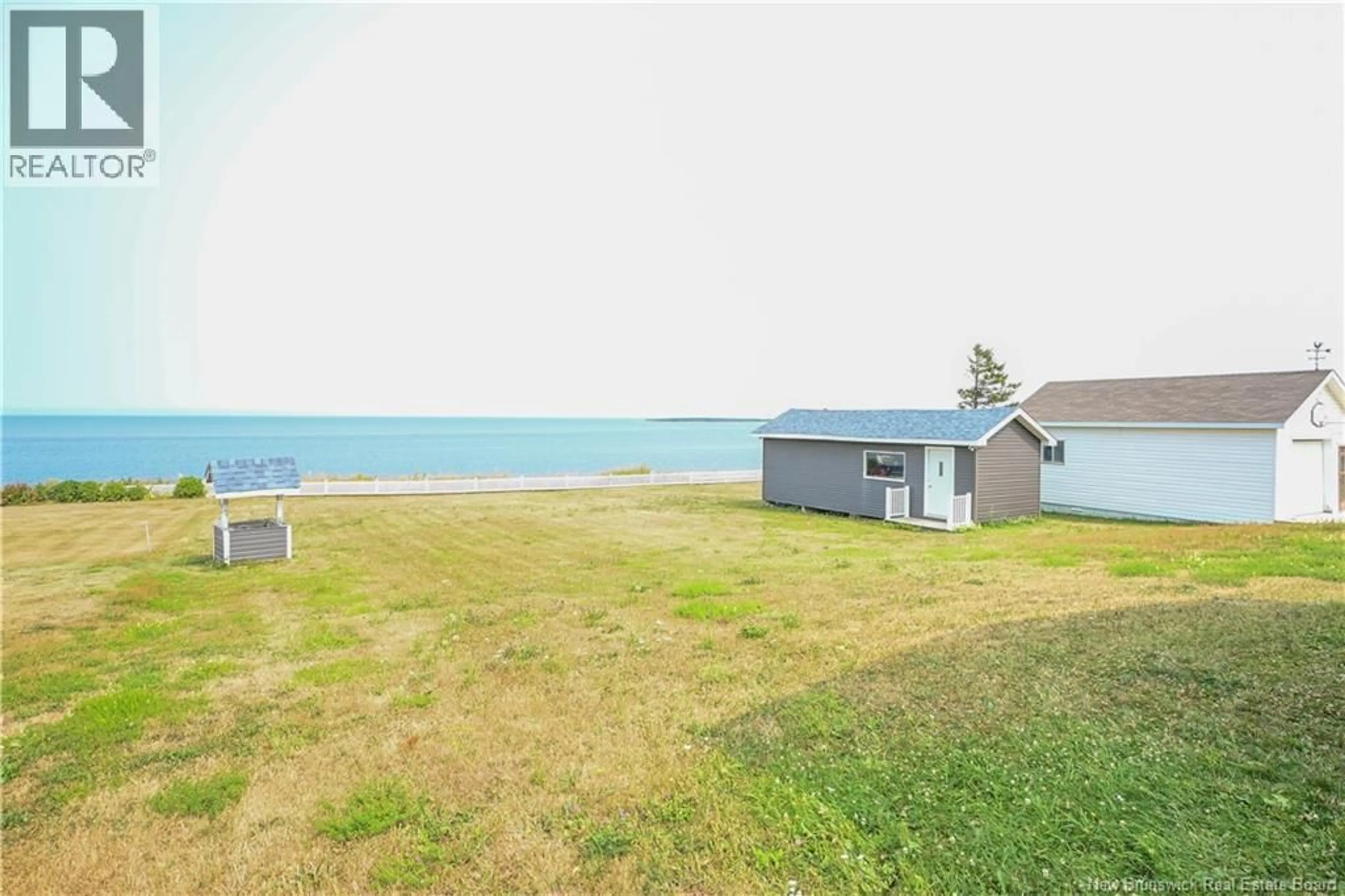 A pic from outside/outdoor area/front of a property/back of a property/a pic from drone, water/lake/river/ocean view for 171 SAINT-PIERRE BOULEVARD, Caraquet New Brunswick E1W1B1