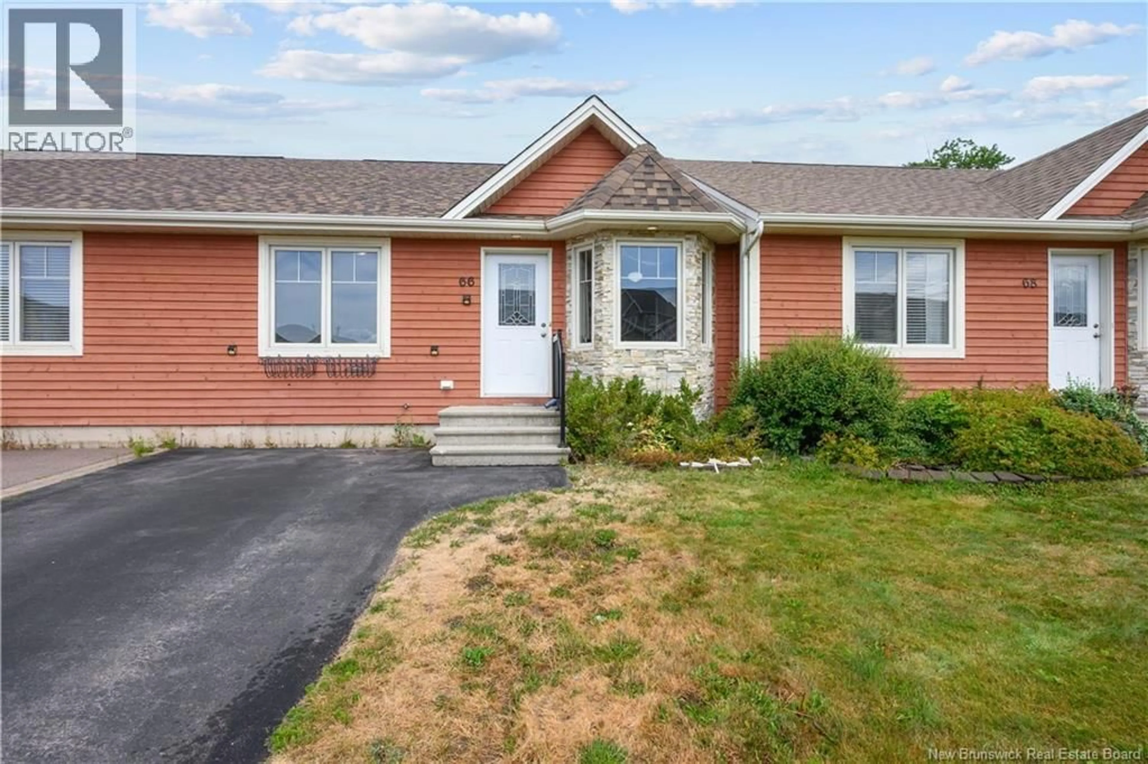 Home with vinyl exterior material, street for 66 LAKEBURN, Dieppe New Brunswick E1A0Y7