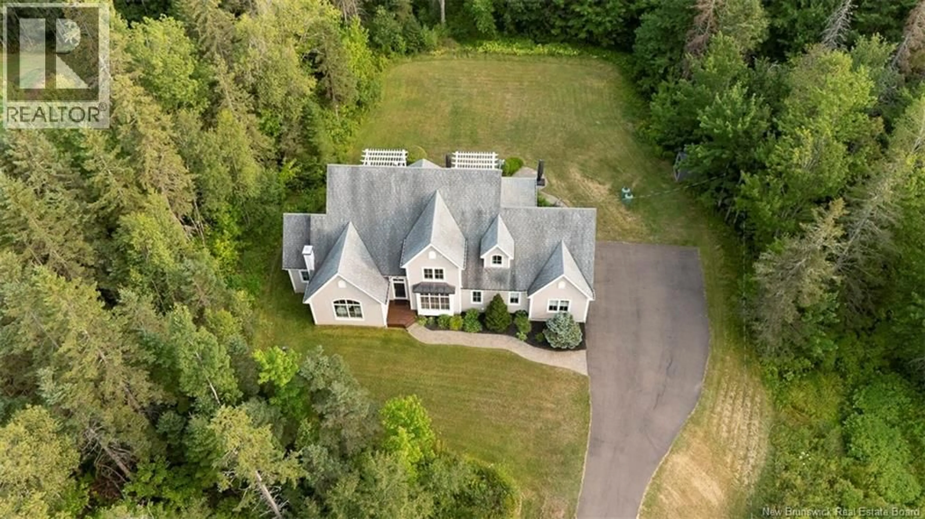 A pic from outside/outdoor area/front of a property/back of a property/a pic from drone, street for 450 LEBLANC, Dieppe New Brunswick E1A7N4