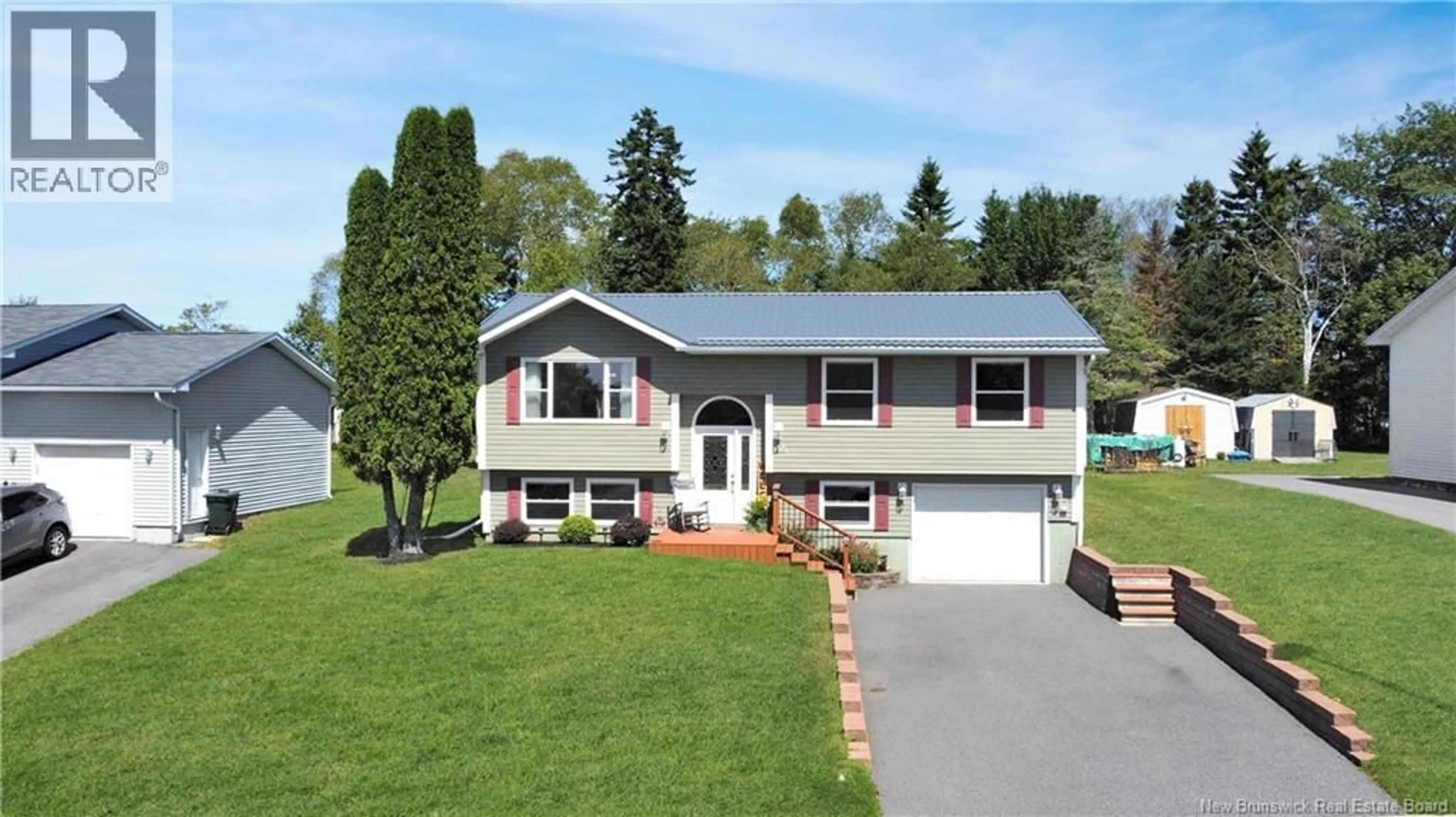 Home with vinyl exterior material, street for 15 HERNANI COURT, Saint John New Brunswick E2M5P8
