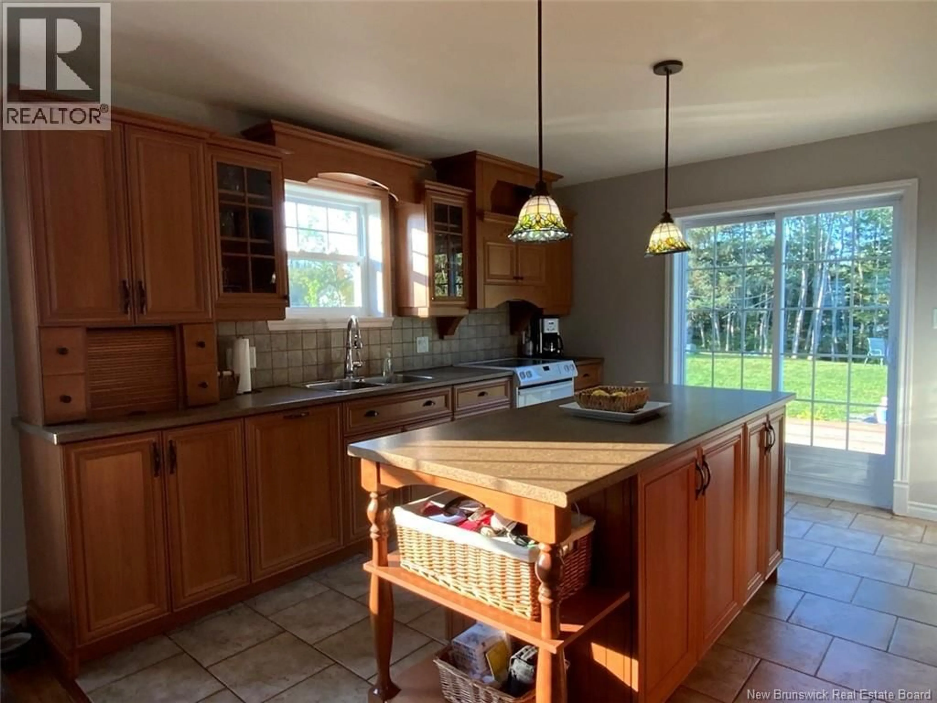 Open concept kitchen, ceramic/tile floor for 105 RUE MAILLET, Saint-Basile New Brunswick E7C2E4