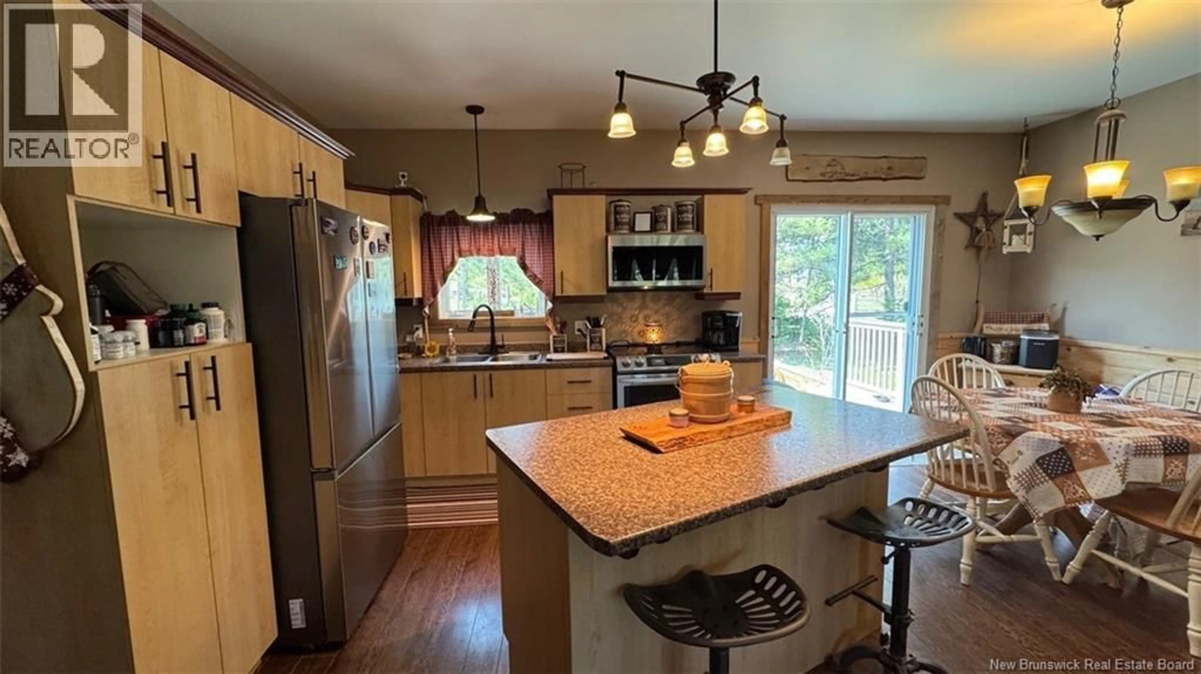 Open concept kitchen, wood/laminate floor for 402 ROUSSEL MARTIN ROAD, Saint-Joseph New Brunswick E7B2R5