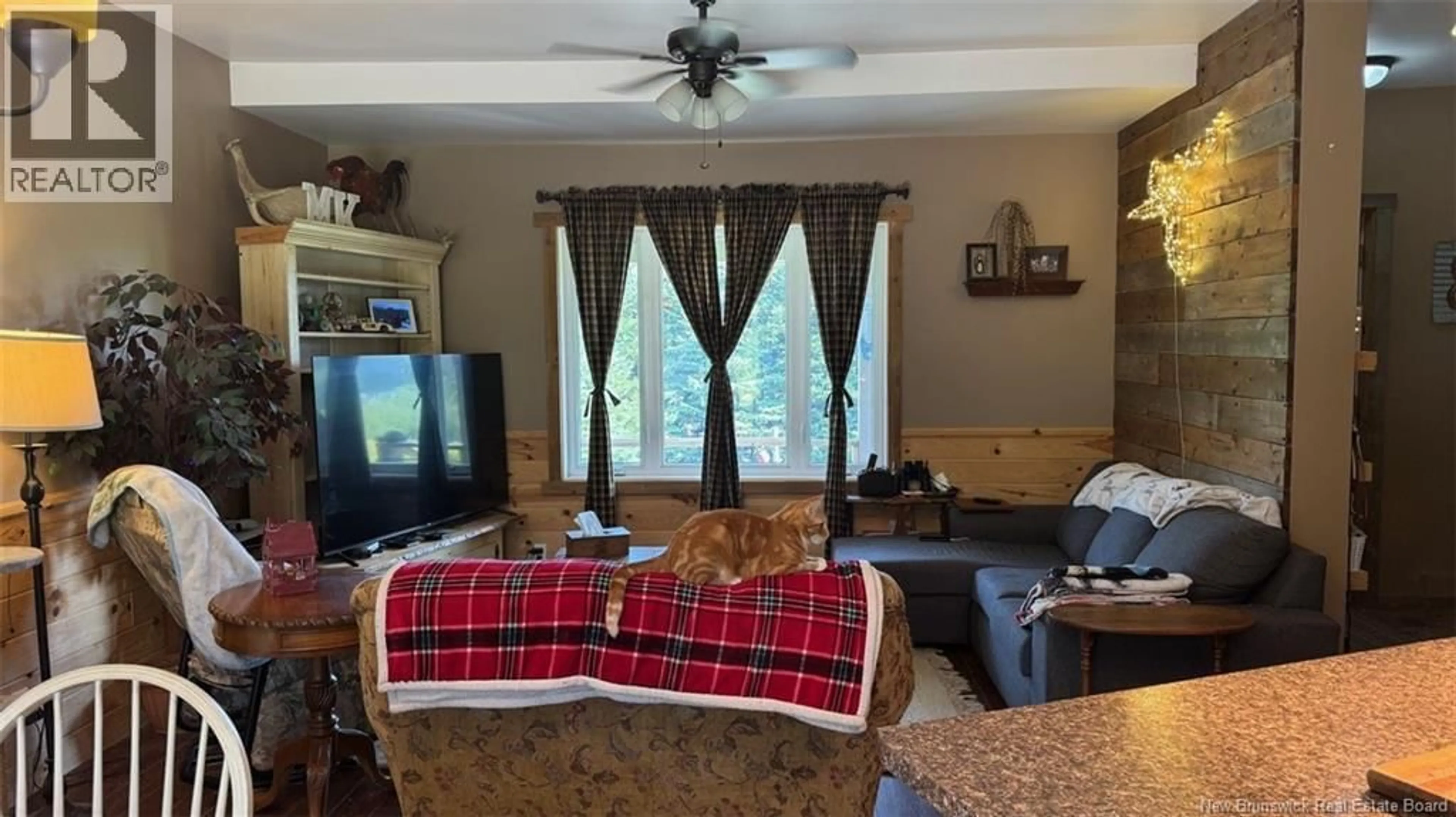 Living room with furniture, unknown for 402 ROUSSEL MARTIN ROAD, Saint-Joseph New Brunswick E7B2R5