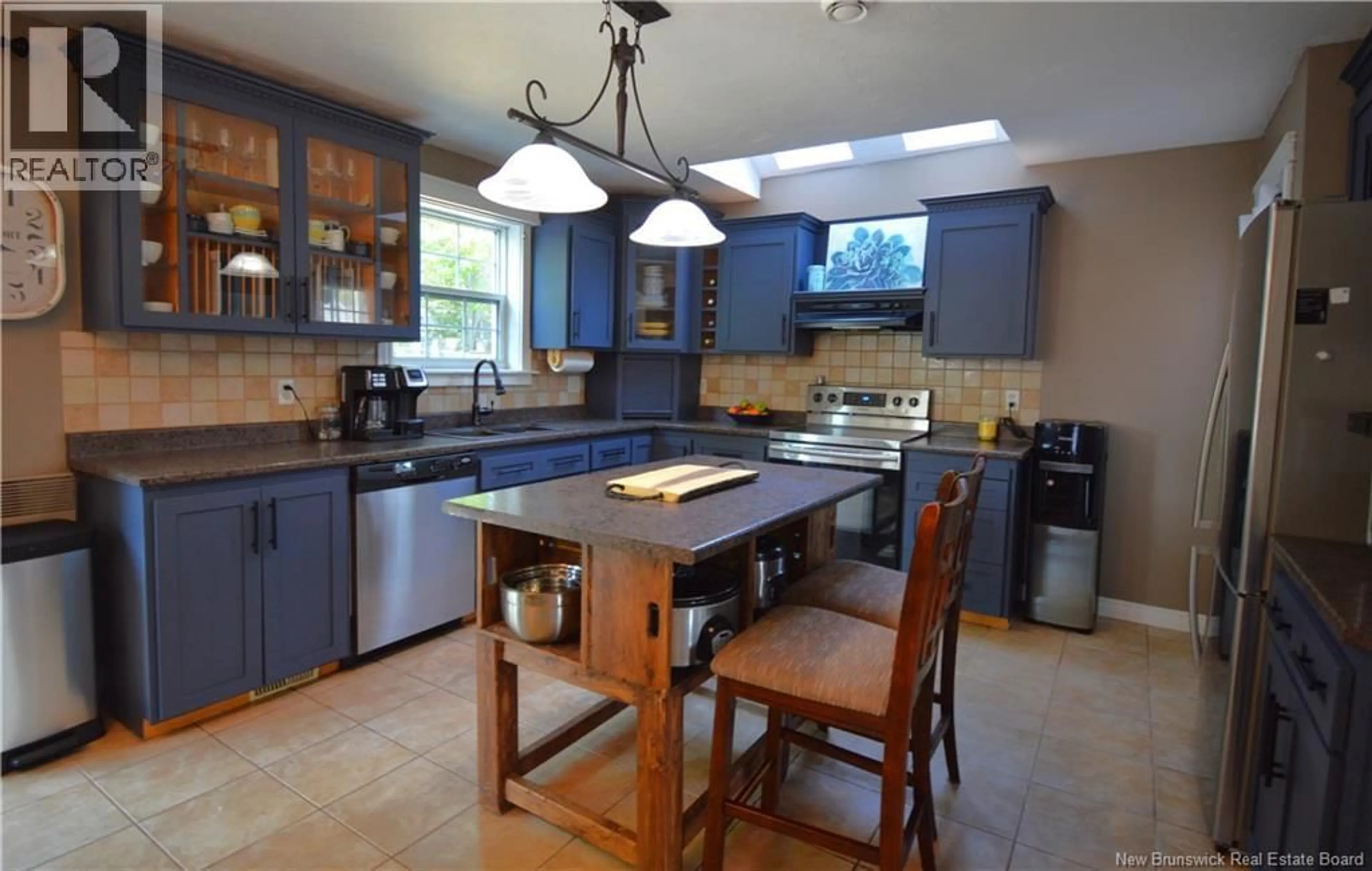 Open concept kitchen, ceramic/tile floor for 287 MANON STREET, Dieppe New Brunswick E1A7W9
