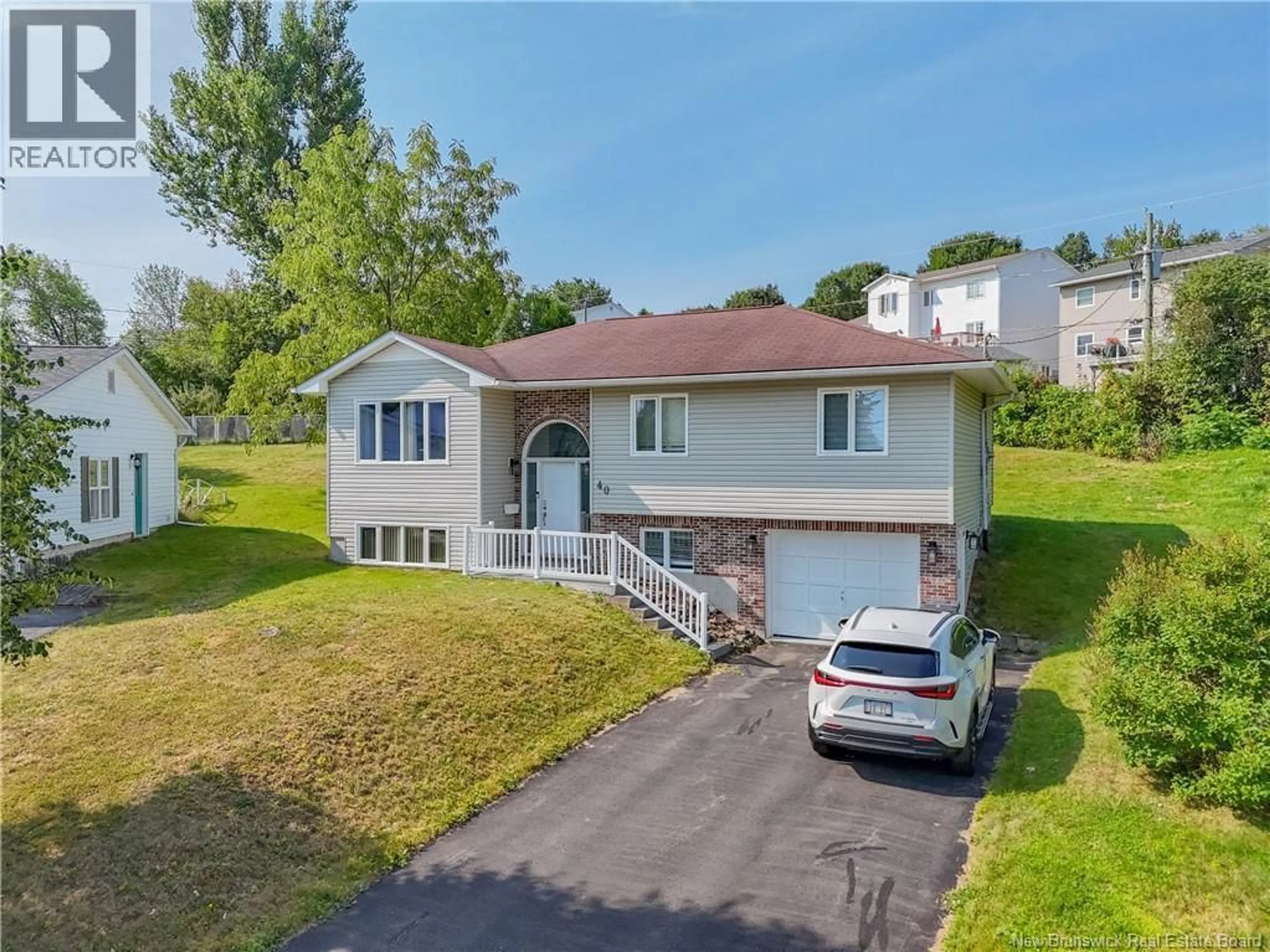 A pic from outside/outdoor area/front of a property/back of a property/a pic from drone, street for 40 CARTER COURT, Fredericton New Brunswick E3B6Y1