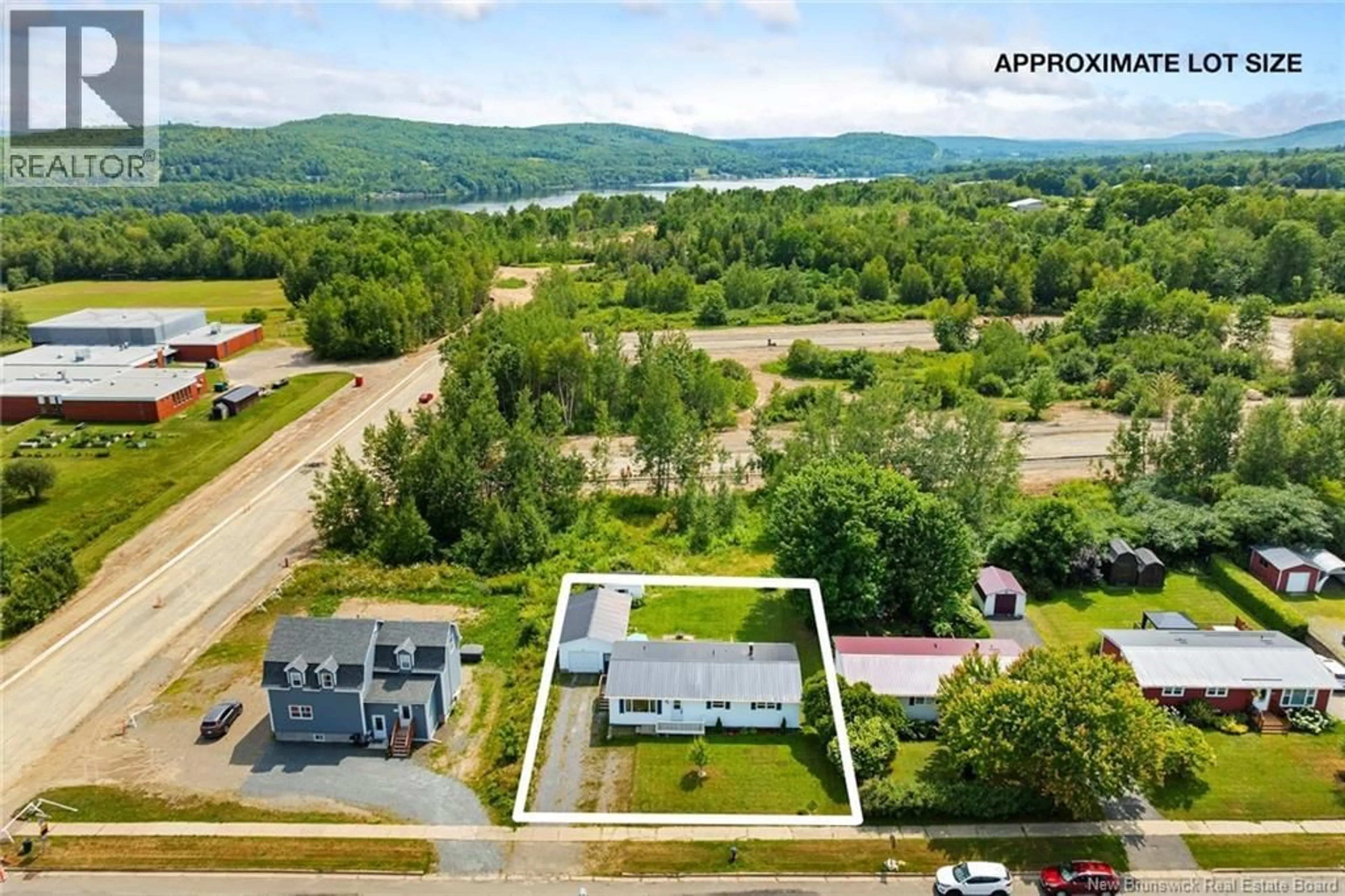 A pic from outside/outdoor area/front of a property/back of a property/a pic from drone, water/lake/river/ocean view for 86 LANDEGGER DRIVE, Nackawic New Brunswick E3G1G2
