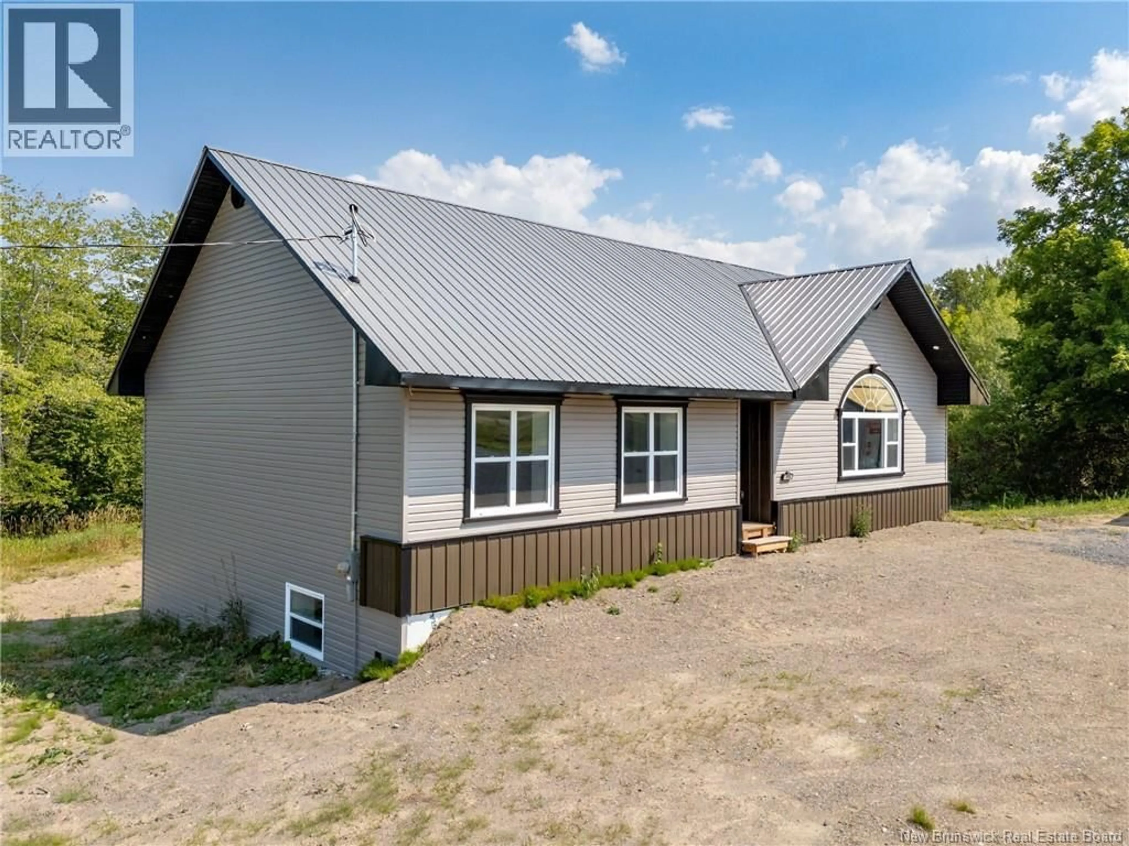 A pic from outside/outdoor area/front of a property/back of a property/a pic from drone, building for 173 ROUTE 3, New Market New Brunswick E6K2W3