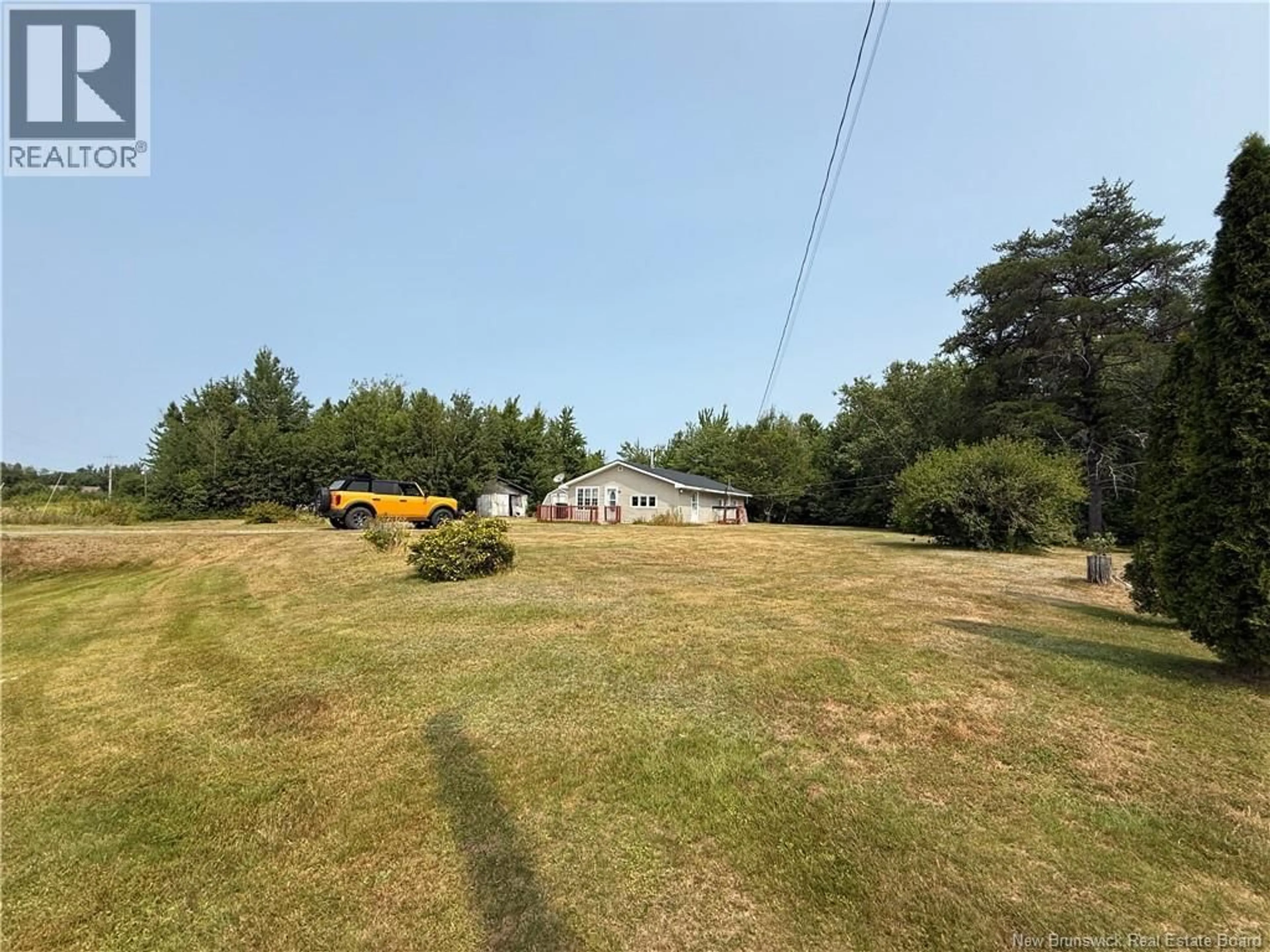 A pic from outside/outdoor area/front of a property/back of a property/a pic from drone, unknown for 91 EEL RIVER ROAD, Baie-Sainte-Anne New Brunswick E9A1N8
