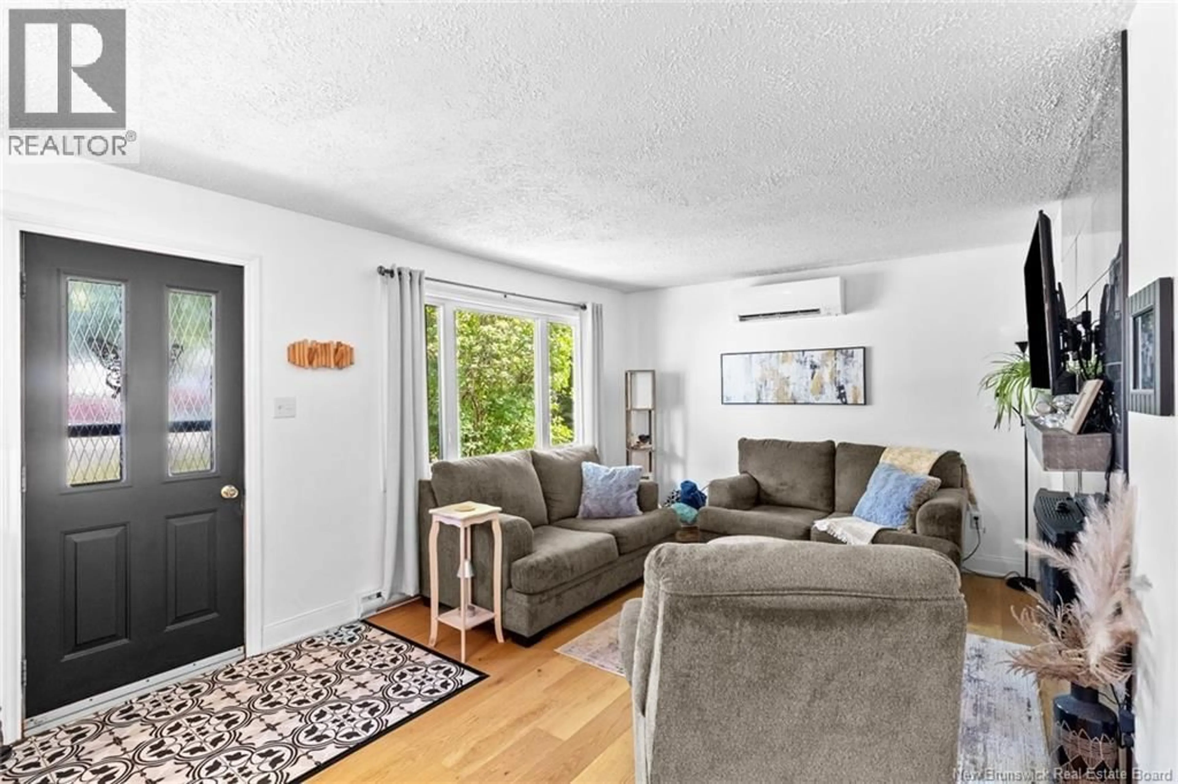 Living room with furniture, unknown for 10 MCINNIS COURT, Fredericton New Brunswick E3A4G9