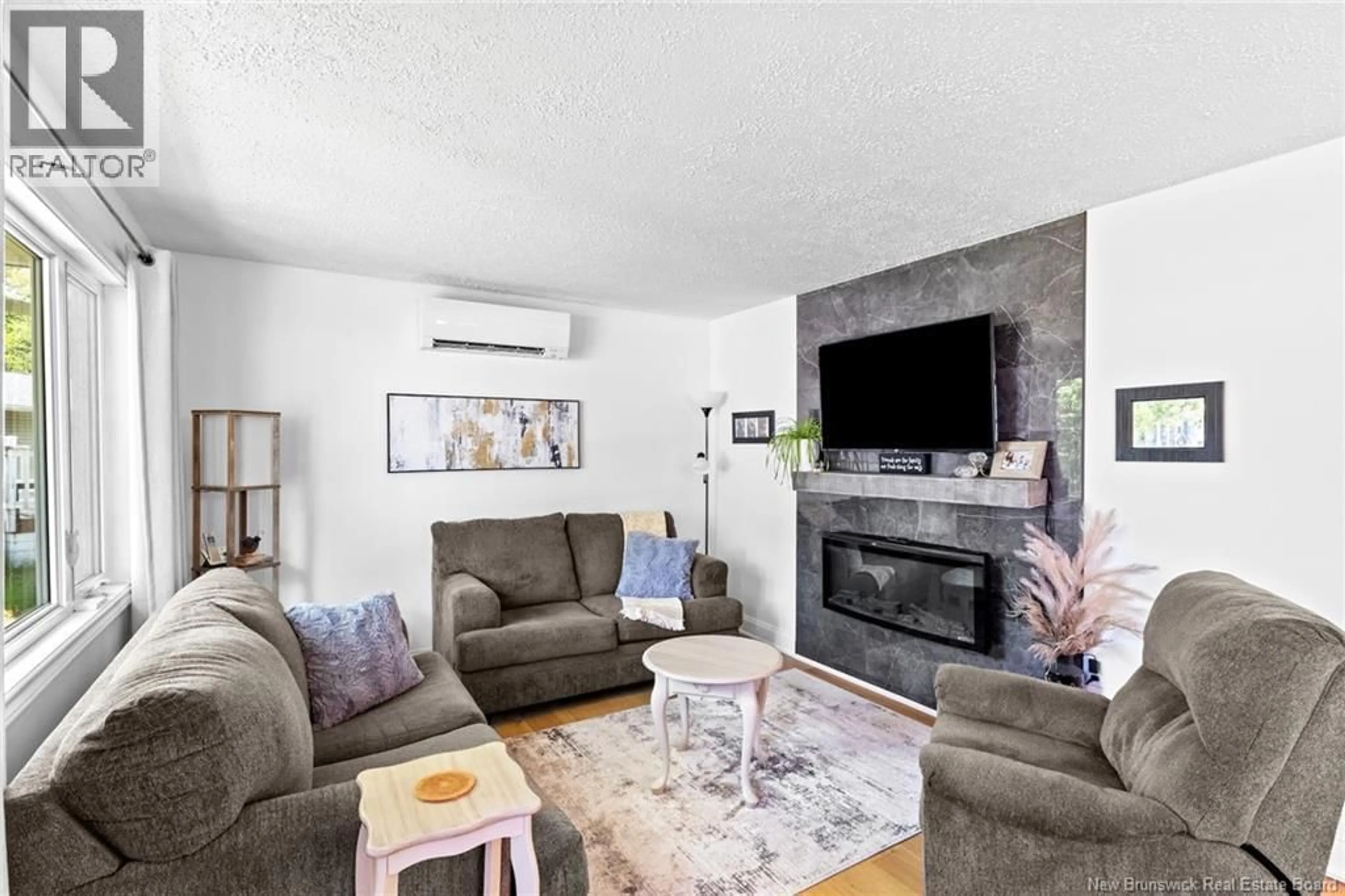 Living room with furniture, unknown for 10 MCINNIS COURT, Fredericton New Brunswick E3A4G9