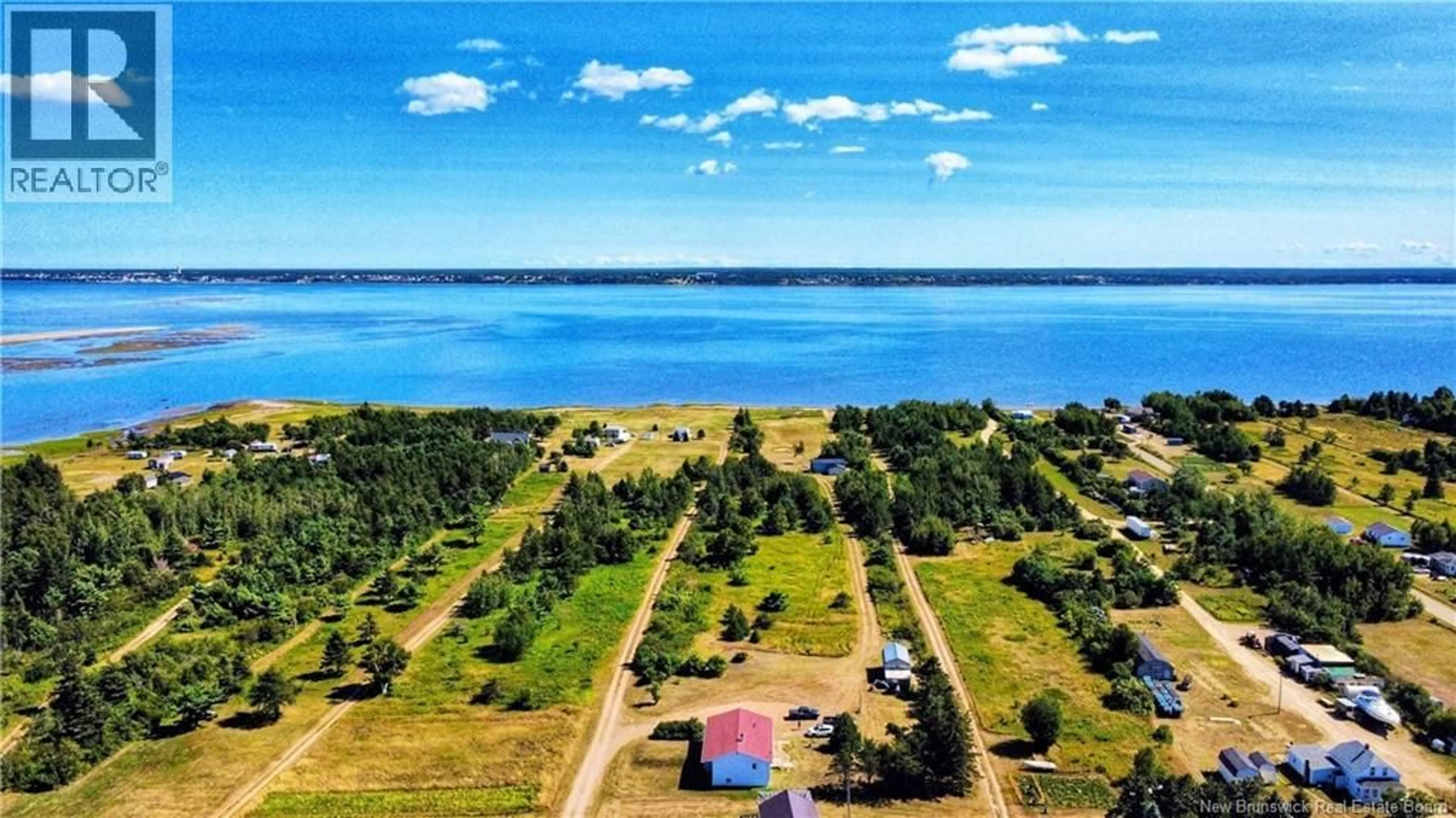 A pic from outside/outdoor area/front of a property/back of a property/a pic from drone, water/lake/river/ocean view for 20 CHEM. JEAN PIERRE, Maisonnette New Brunswick E8N1Z8