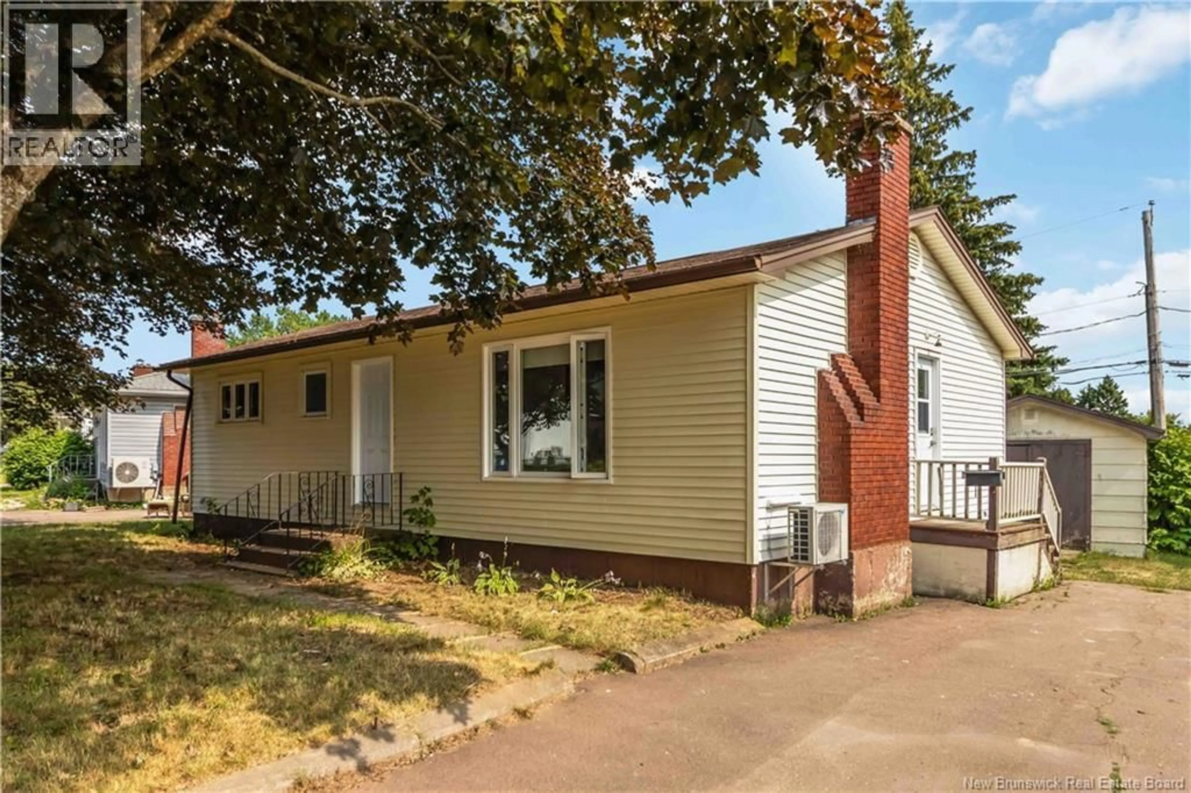 Home with vinyl exterior material, street for 22 WYNWOOD DRIVE, Moncton New Brunswick E1A2M3