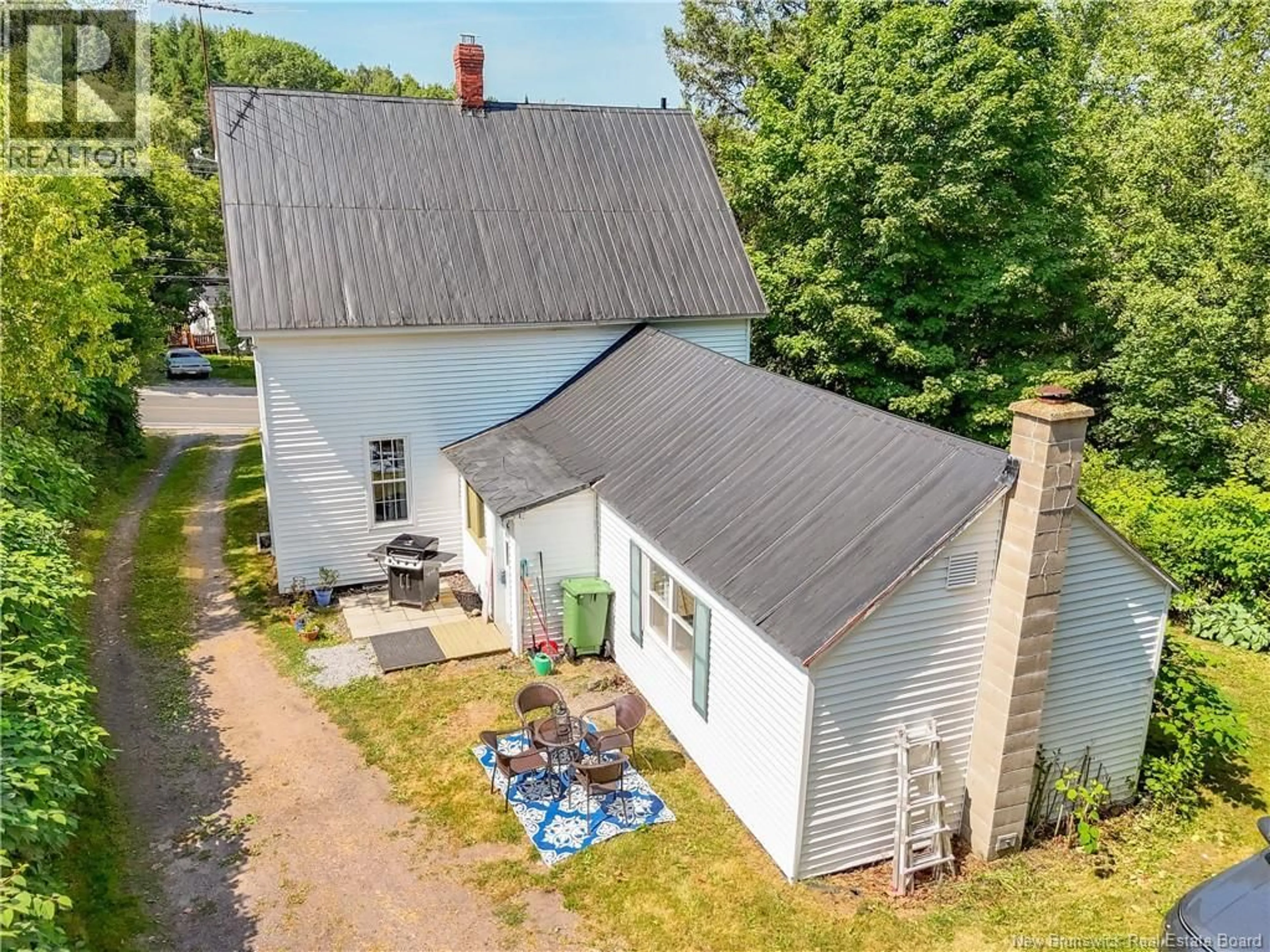 A pic from outside/outdoor area/front of a property/back of a property/a pic from drone, unknown for 51 MAIN STREET, Stanley New Brunswick E3B1A7